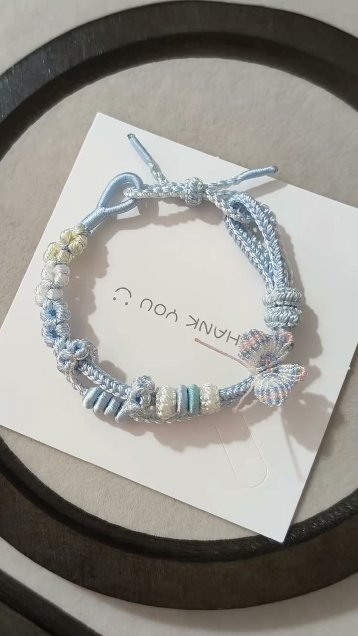 Handwoven Light Blue Bracelet with Floral Decor