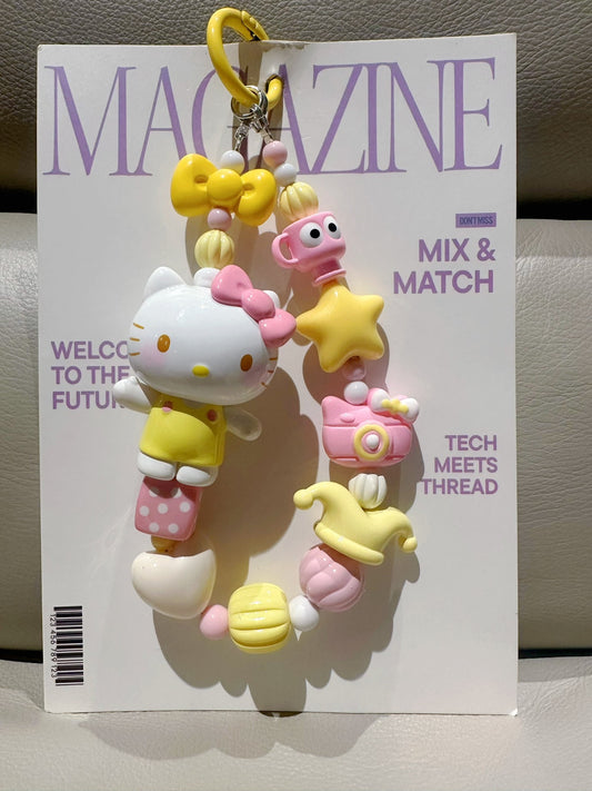 Sanrio White Cat Keychain with Yellow Outfit and Pastel Charms