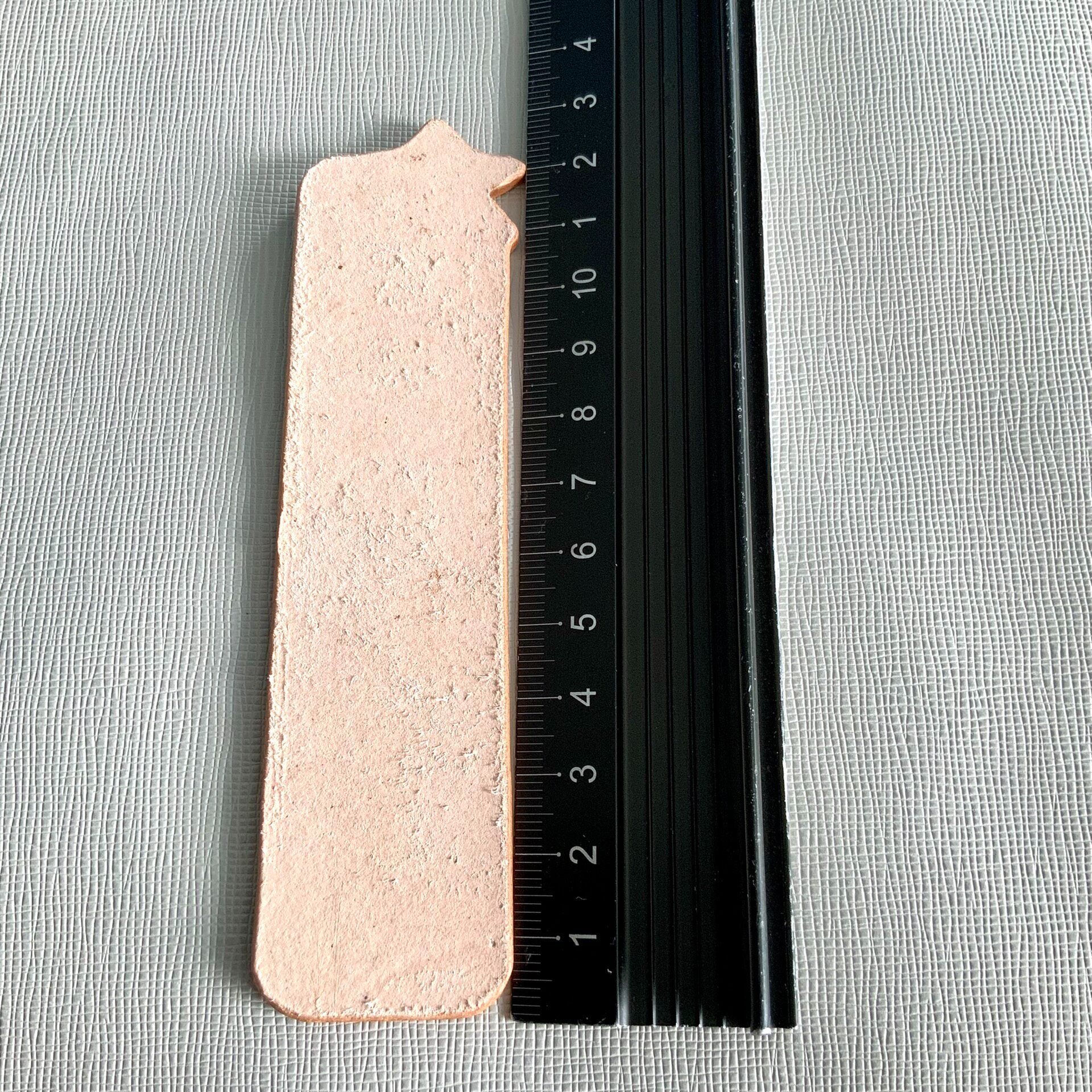 Hand-Painted Leather Bookmark with Star Cutouts