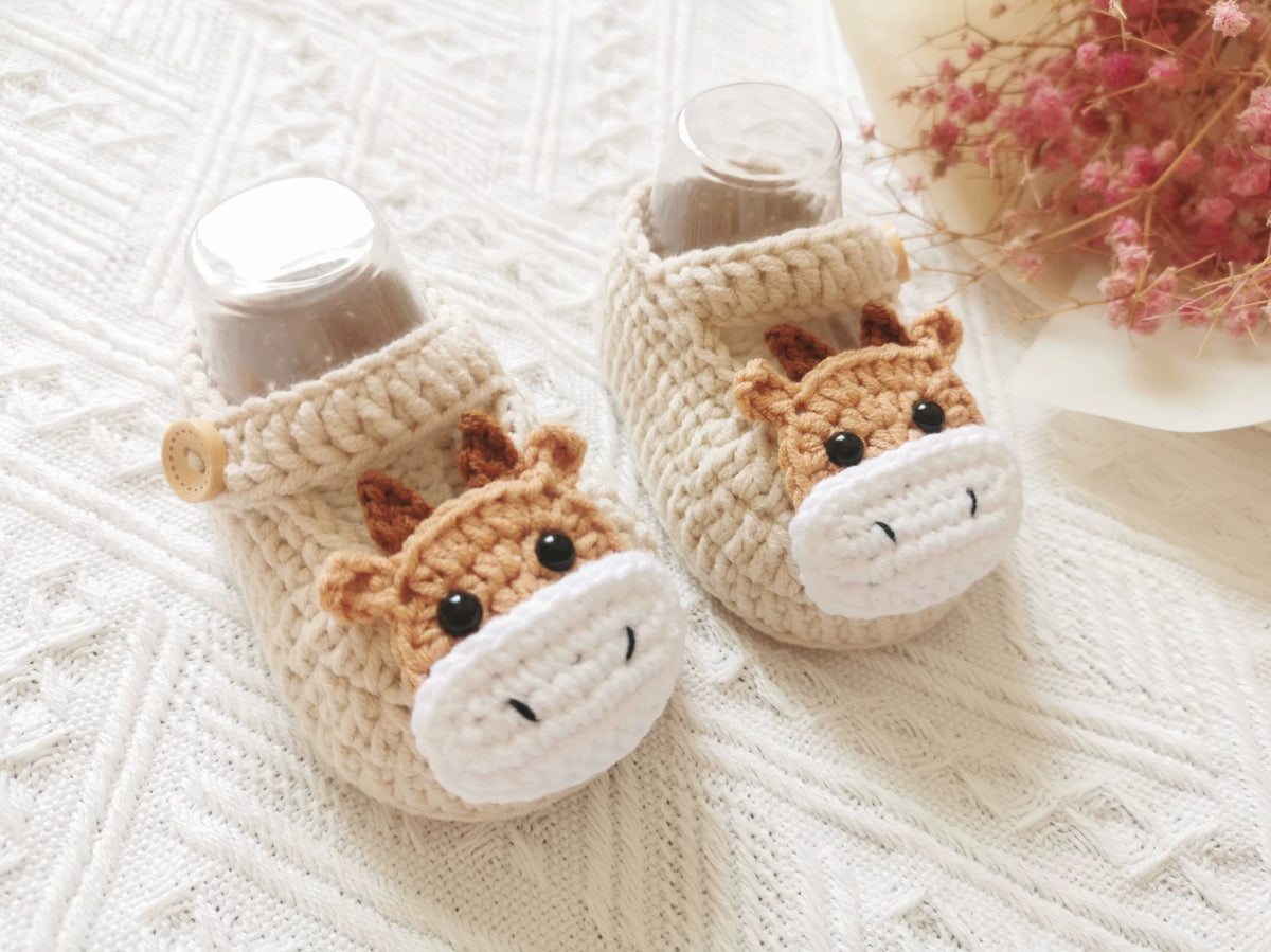Botines de bebé a crochet con motivo de jirafa
