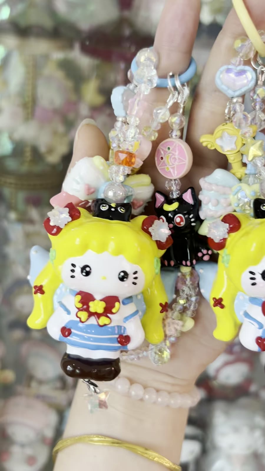 Dragonne de téléphone en perles avec pendentif chat
