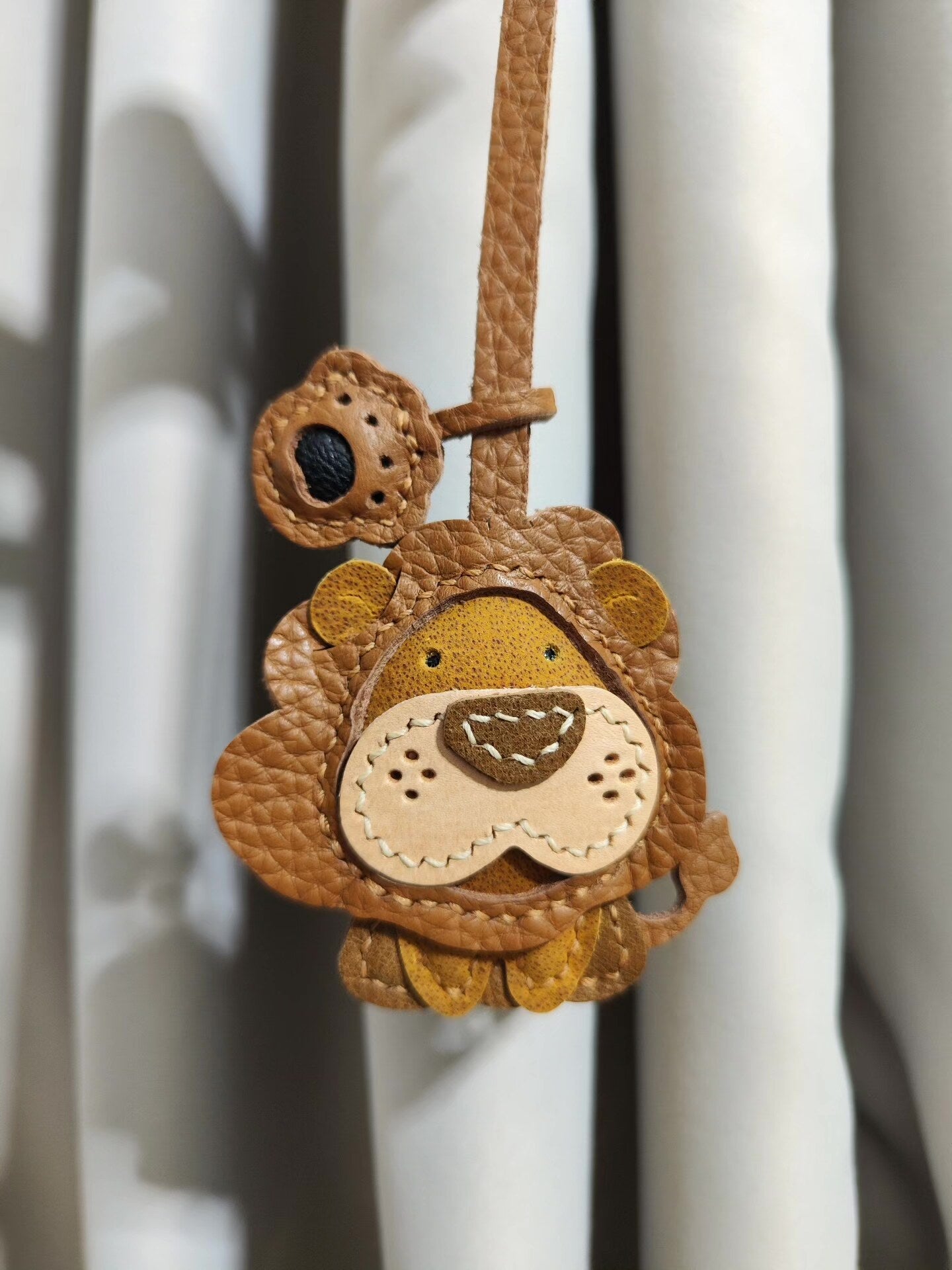 Lion-Shaped Leather Keychain with Detachable Paw Charm