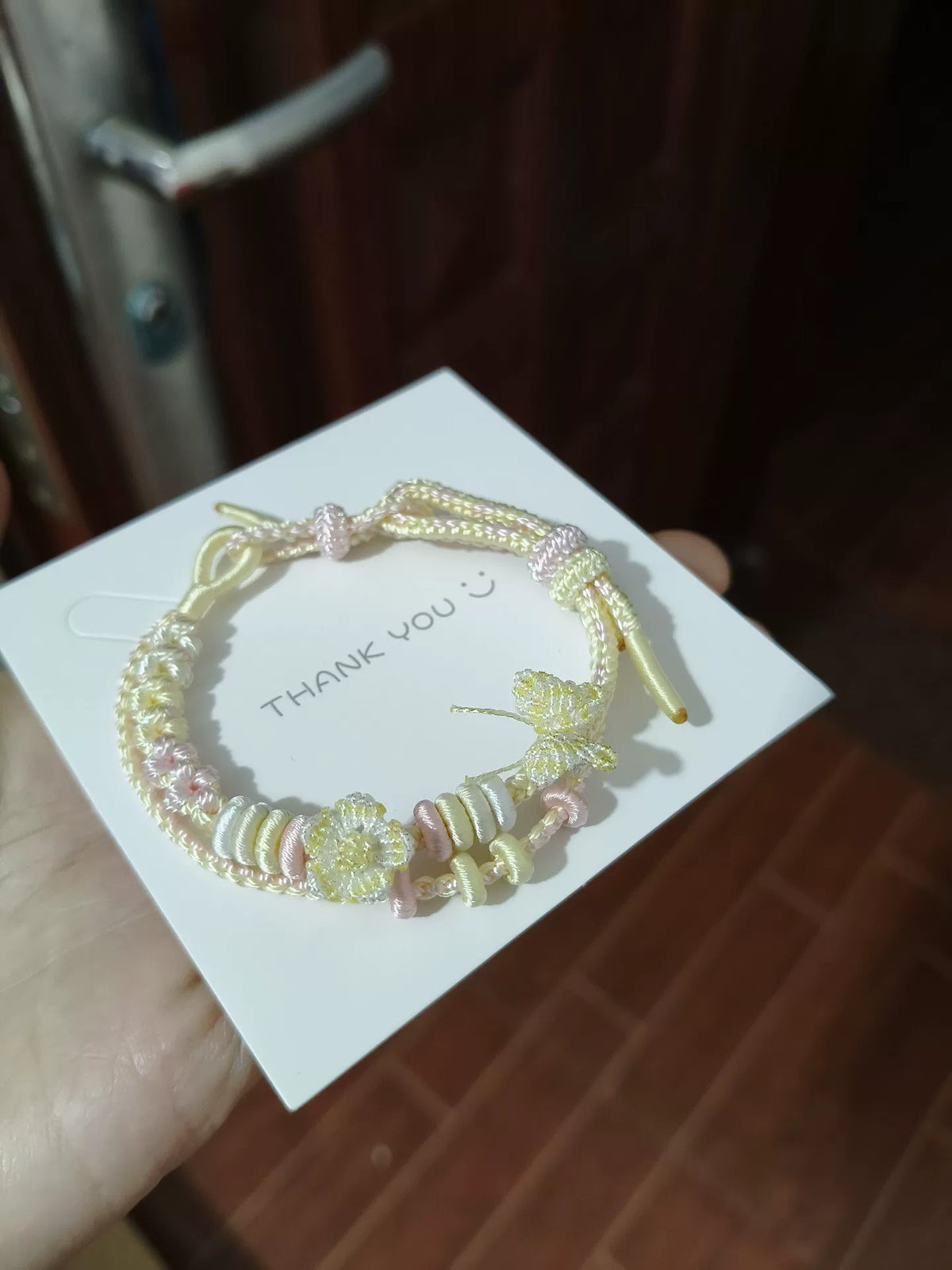 Bracelet en cordon tressé fait main dégradé crème et rose