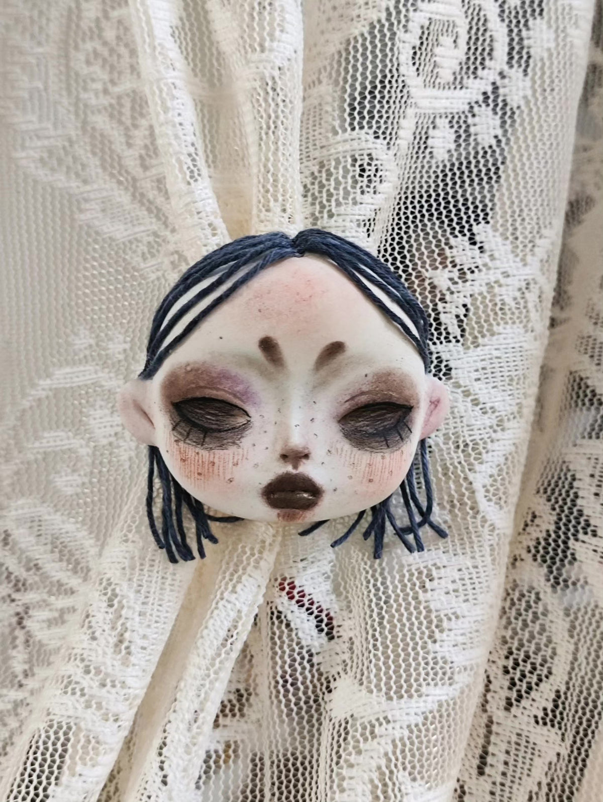 Clay Doll Head Brooch
