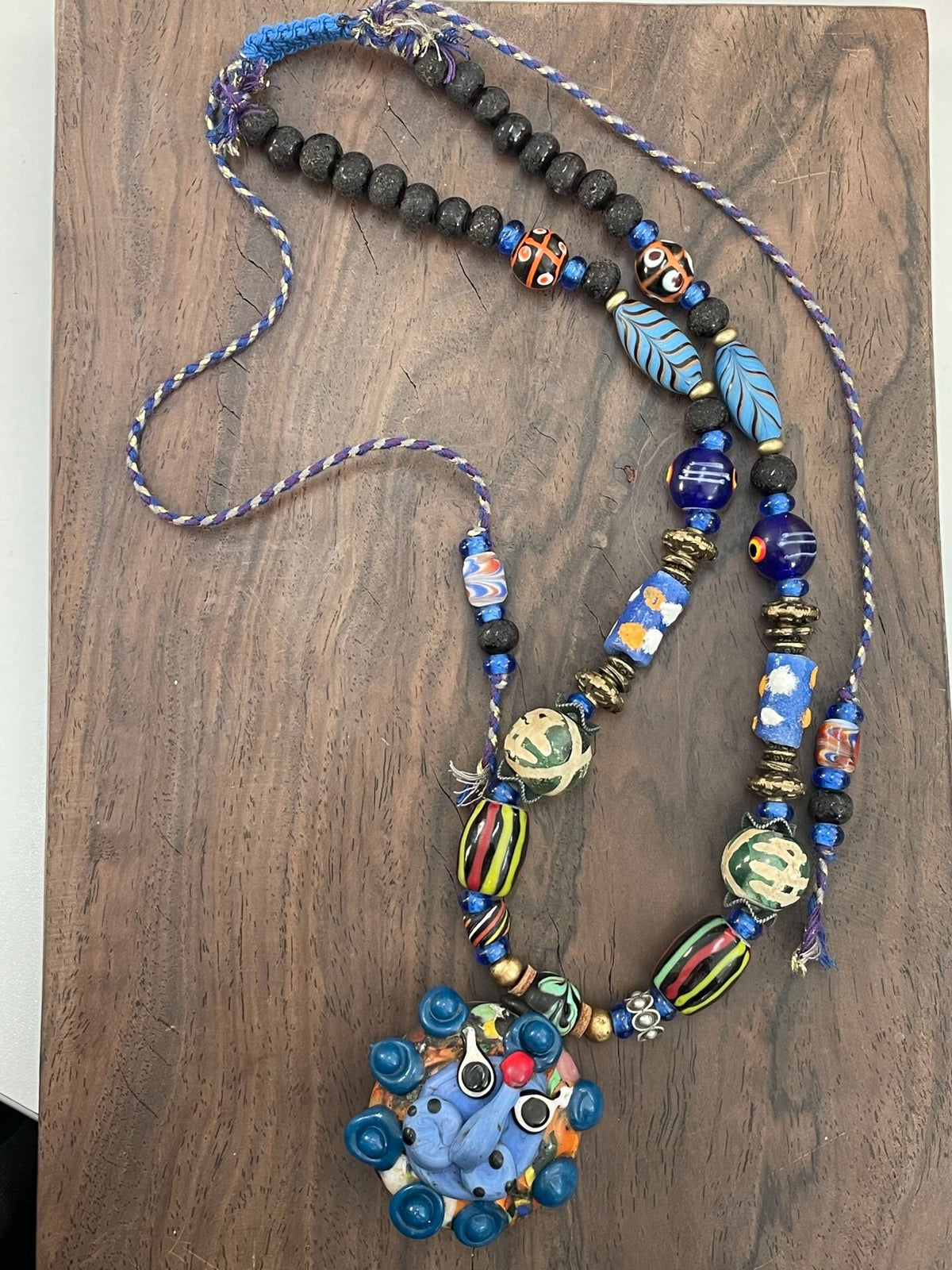 Lion Glass Pendant Necklace Blue Bead Strand
