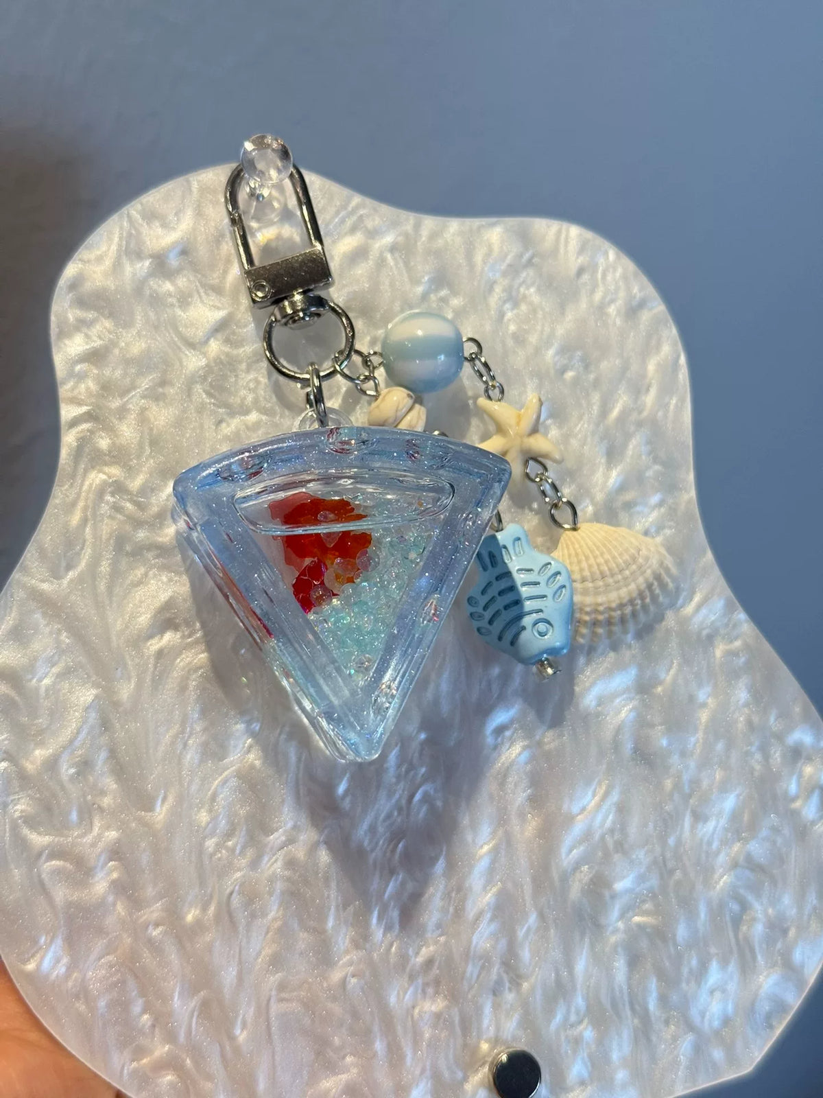 Porte-clés shaker en résine avec huile à sable mobile