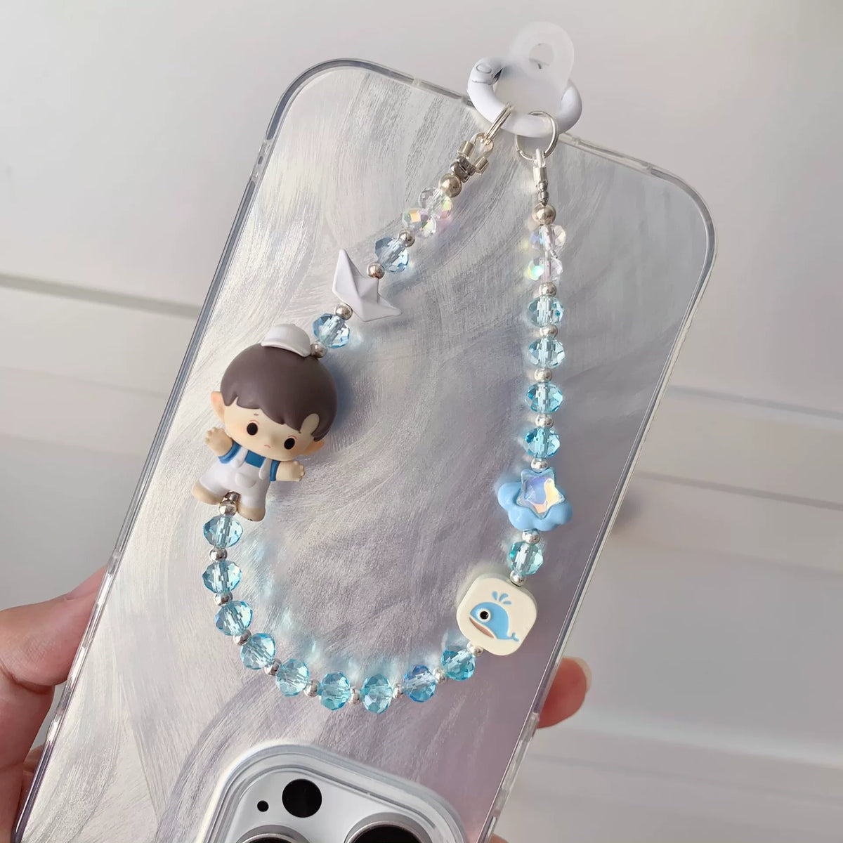 Hacci blå telefonkedja med figur och pärlor