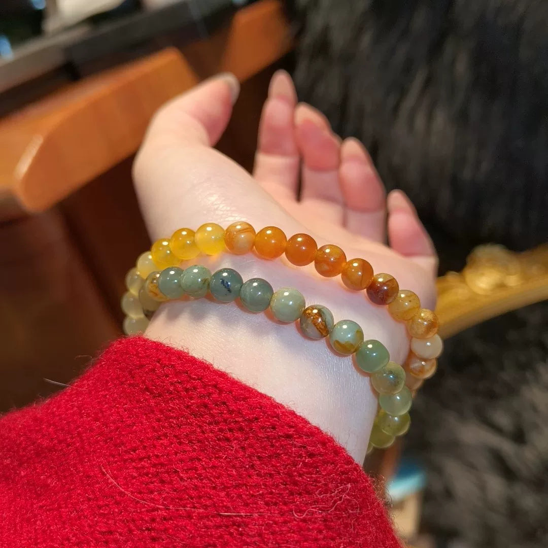 Bracelet double tour en jade de Xiuyan, perle bleue