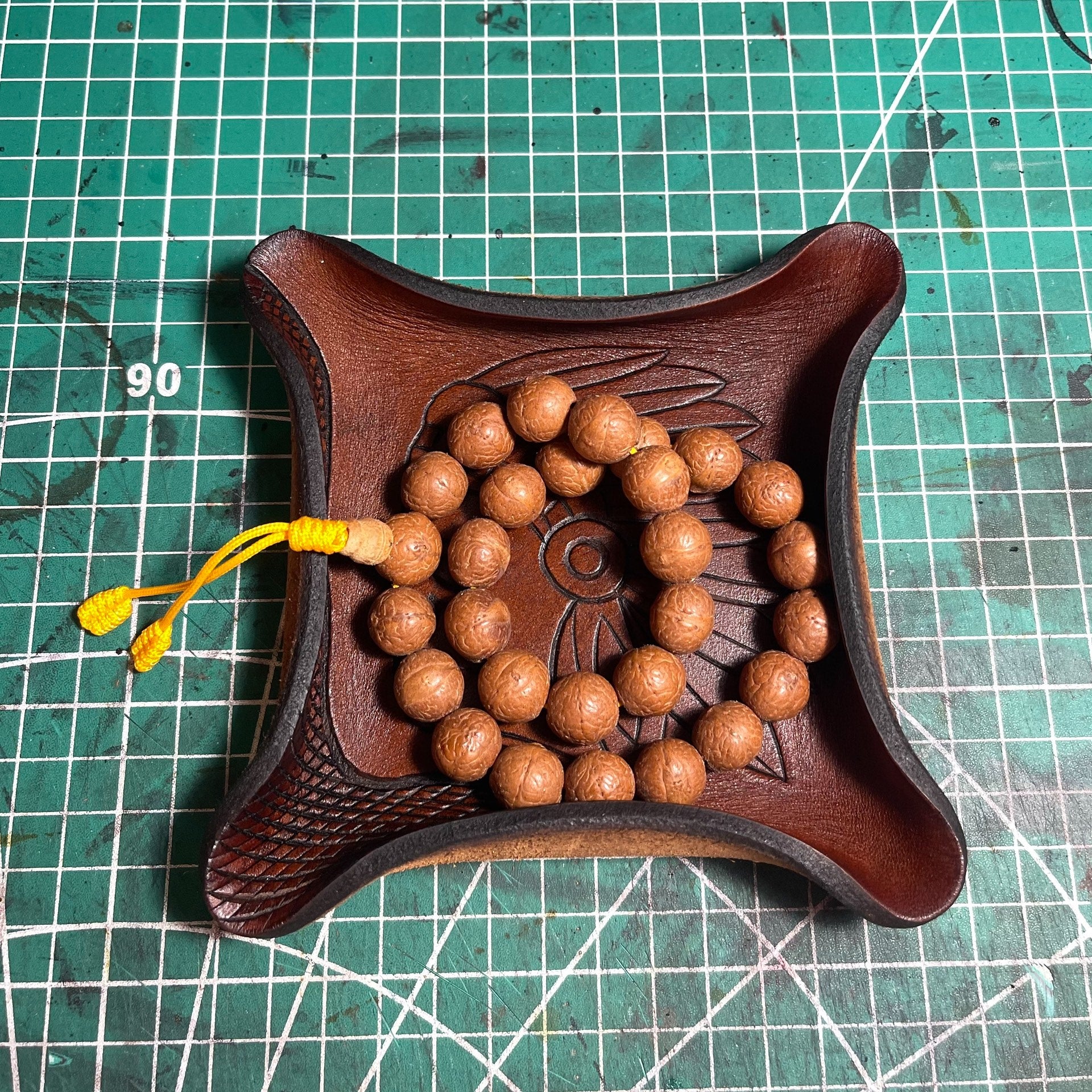 Square Vegetable-Tanned Leather Tray with Carved Portrait