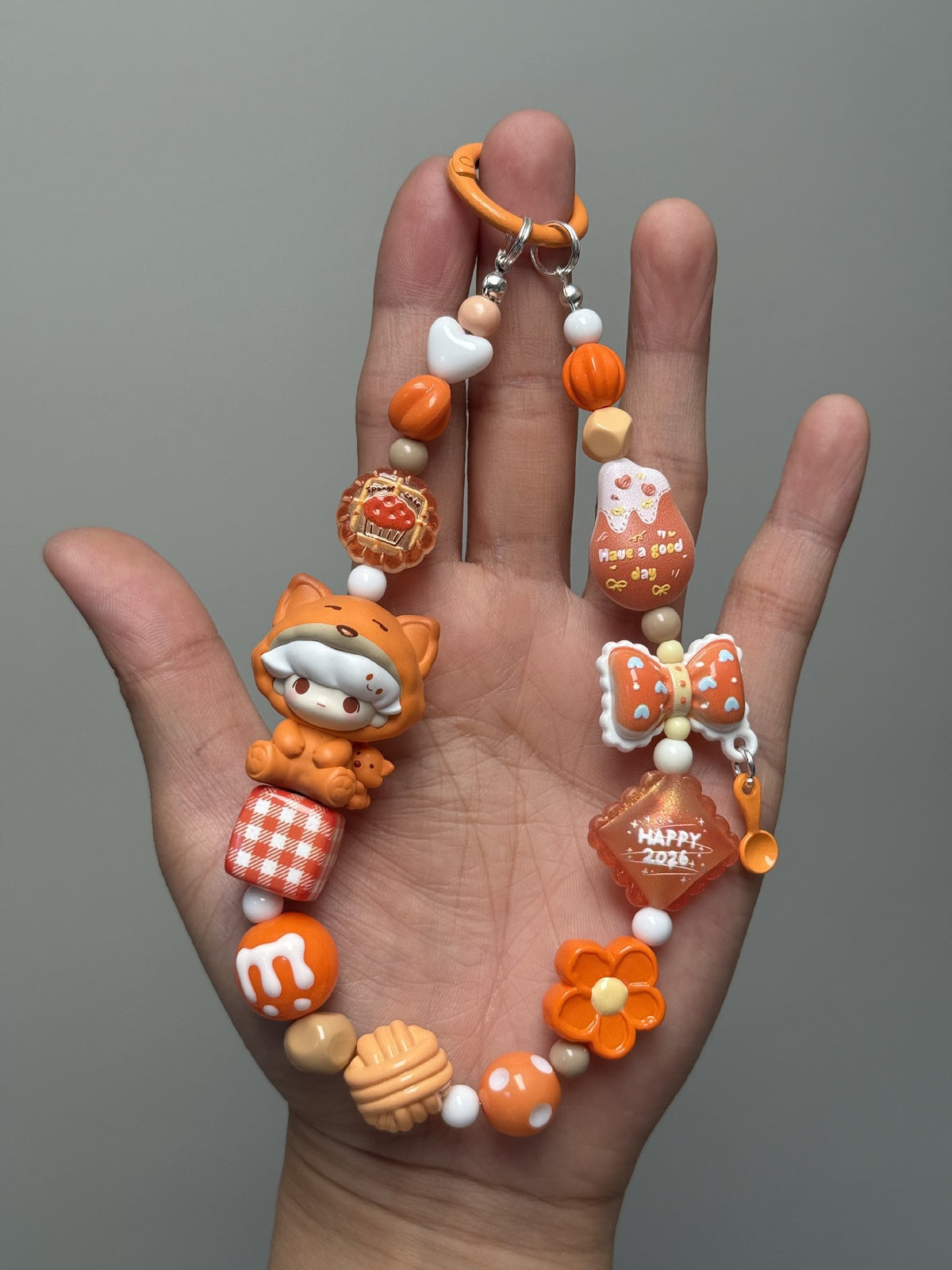 Dimoo Orange Onesie Beaded Phone Strap Charm