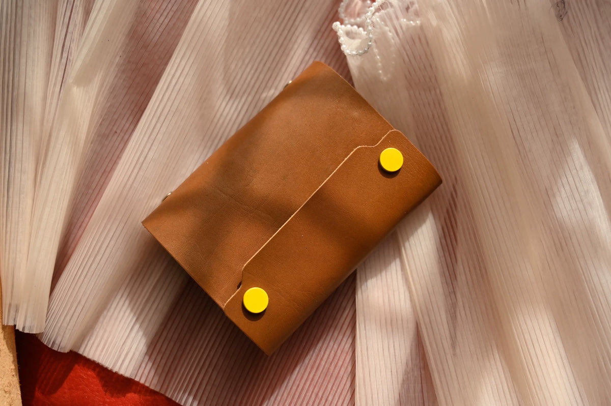 Funda para carpeta de anillas A7 en cuero curtido al vegetal