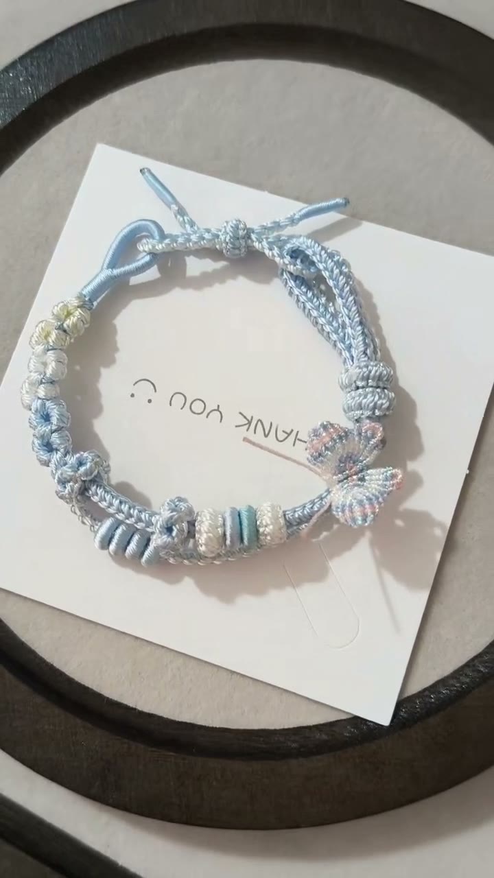 Handwoven Light Blue Bracelet with Floral Decor