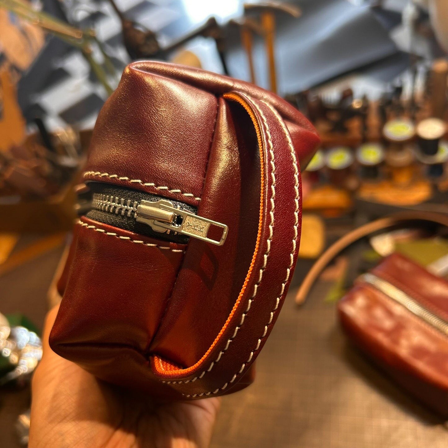 Reddish-Brown Full-Grain Leather Rectangular Pouch with Dual-Zipper Closure