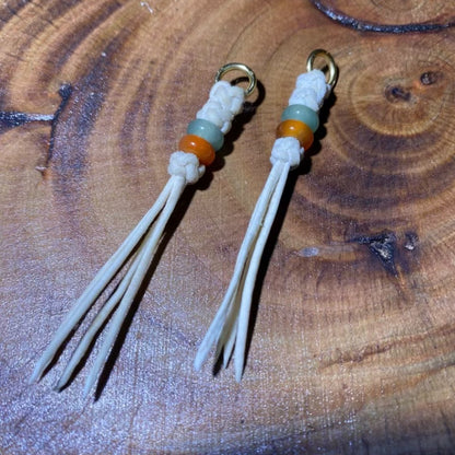 Handcrafted Tibetan Tassel with White Leather Cord and Green and Amber Beads
