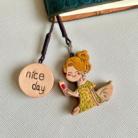 Leather Charm Set with Fairy Figure and "nice day" Disc