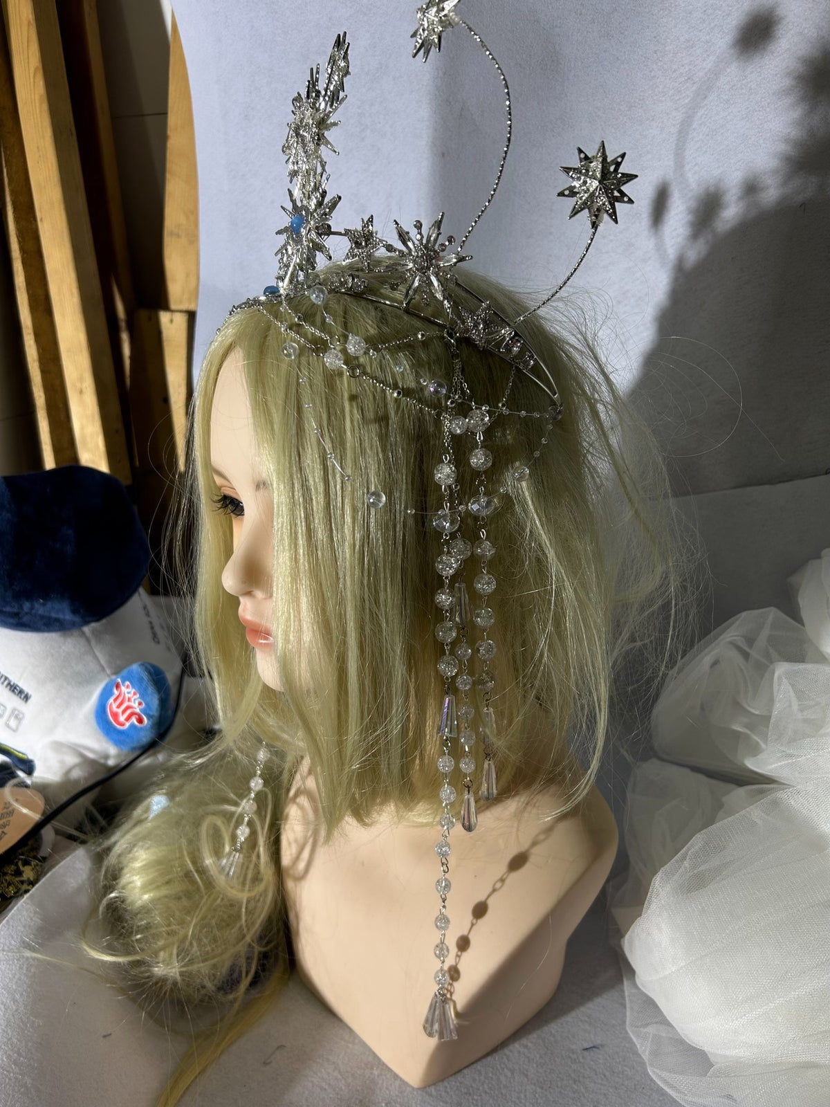 Tocado de tiara con estrellas y rayos de plata