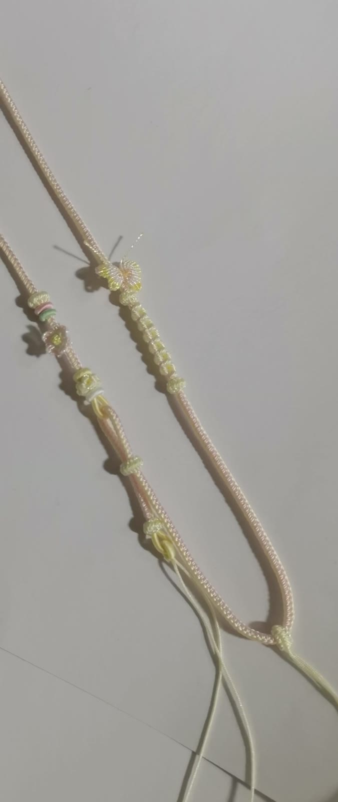 Cordon de collier tressé artisanal dégradé rose et vert