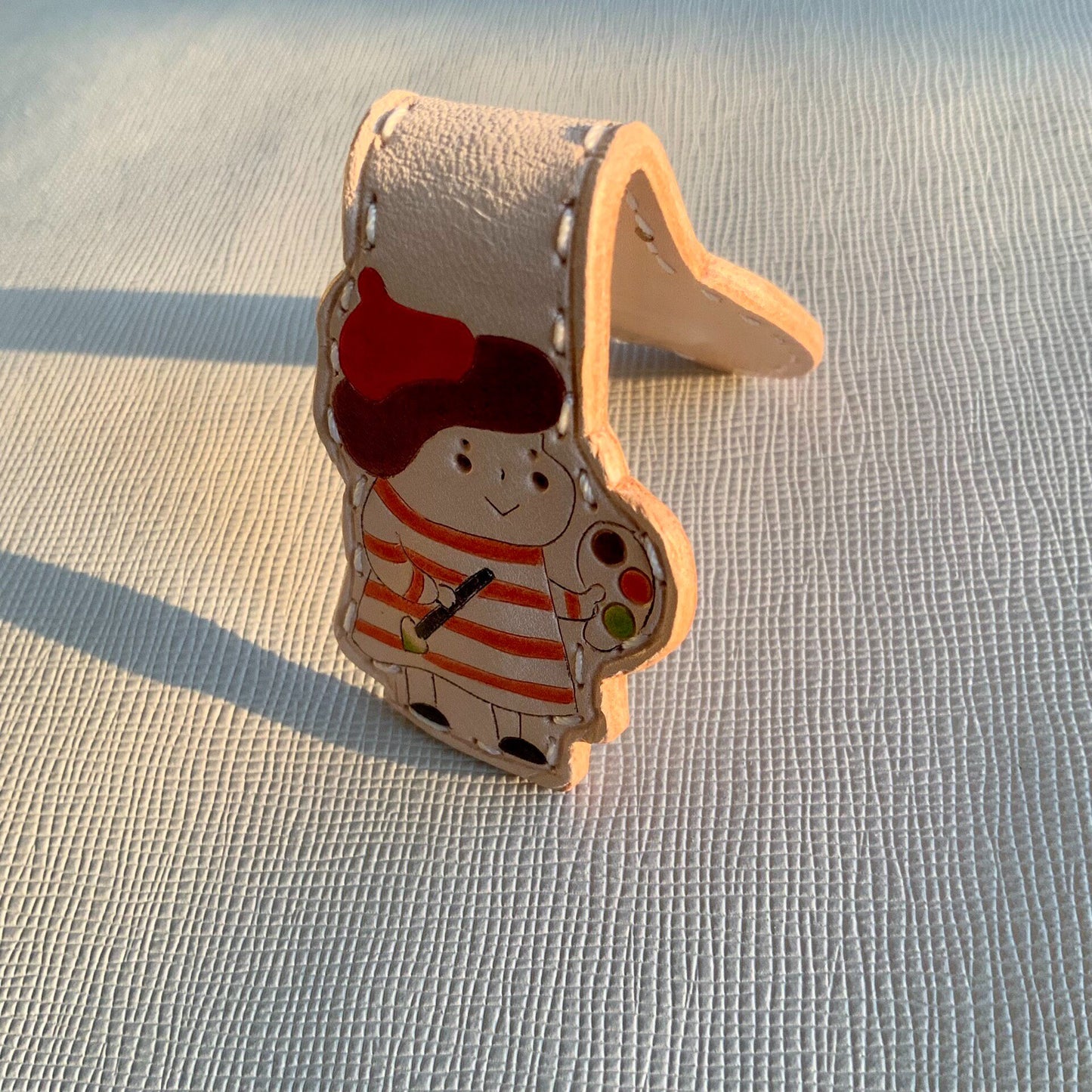 Handcrafted Leather Magnetic Bookmark with Artist Character Design