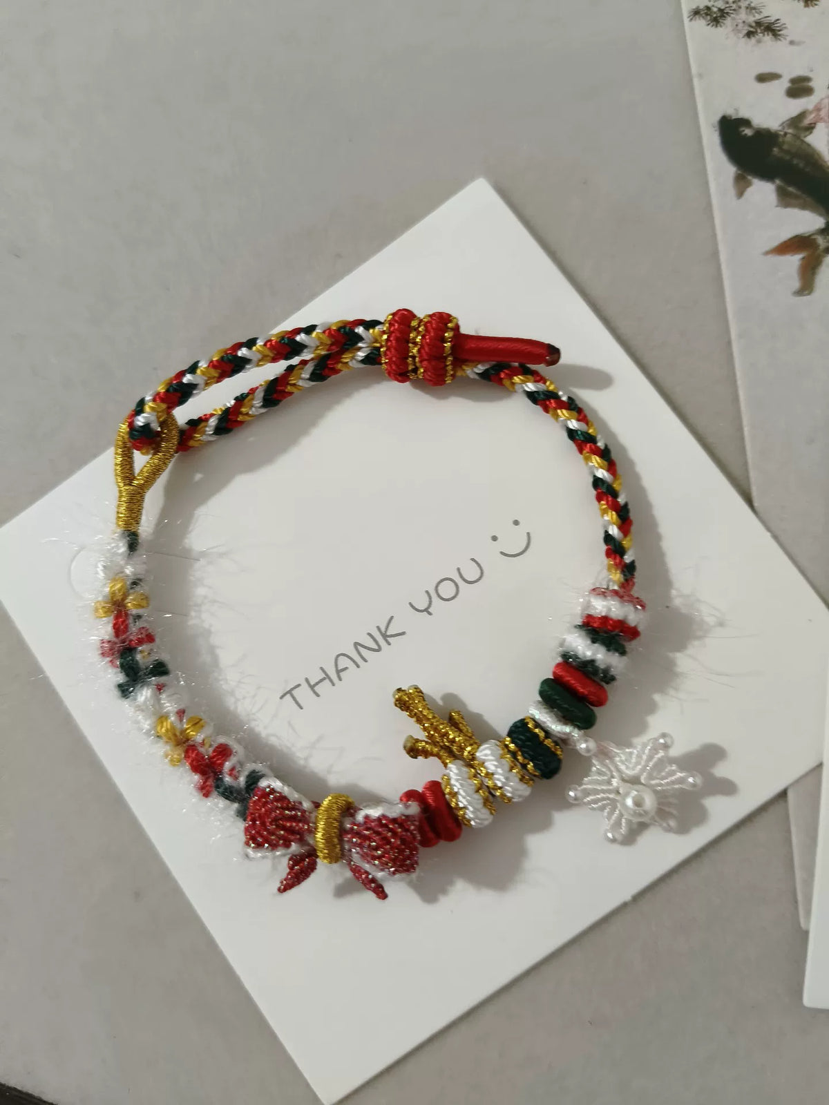 Handgevlochten Kerstomarmband Rood Goud Groen Wit