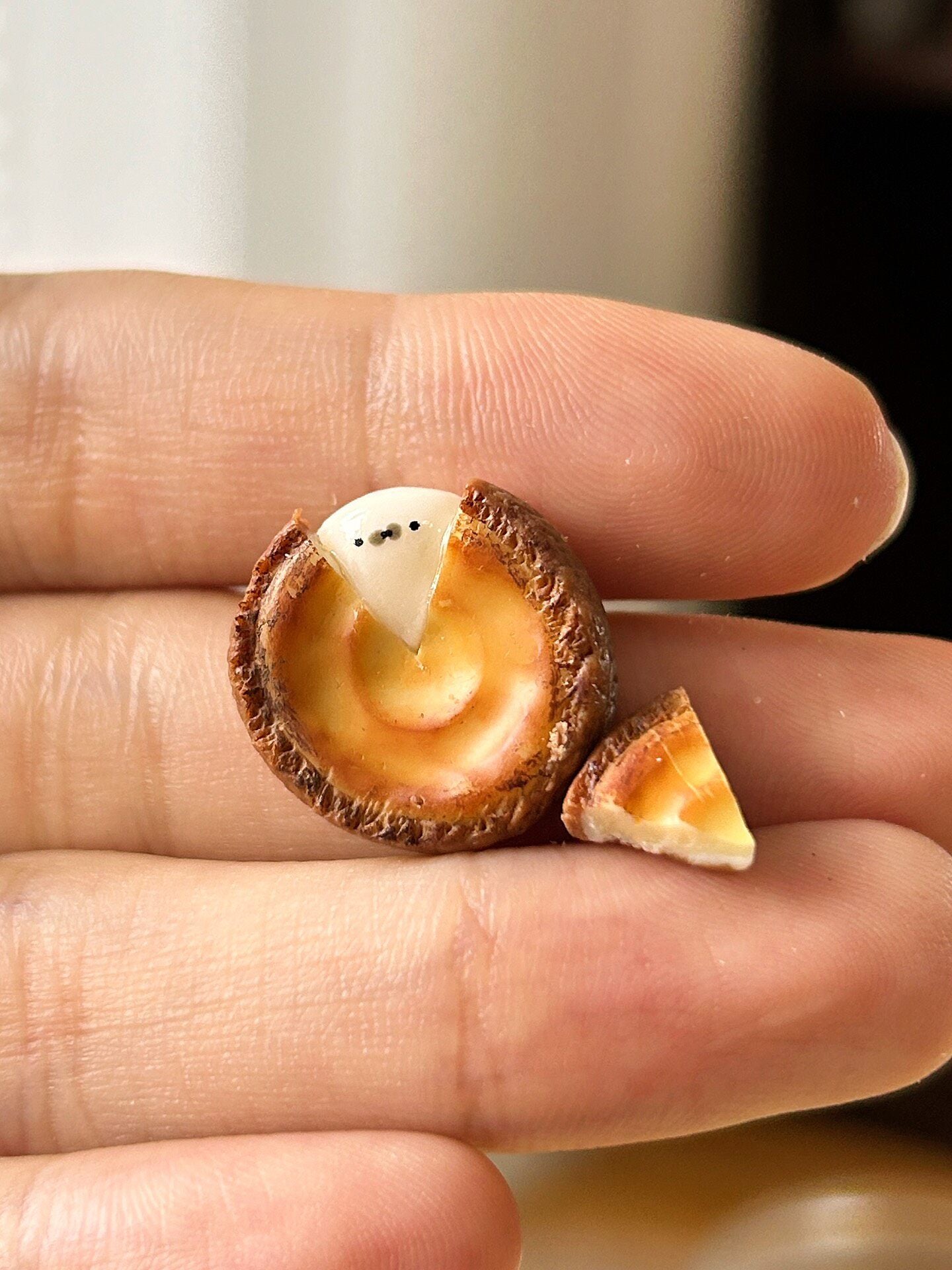 Miniature Cheesecake Replica with Ghost Figure and Cutaway Slice