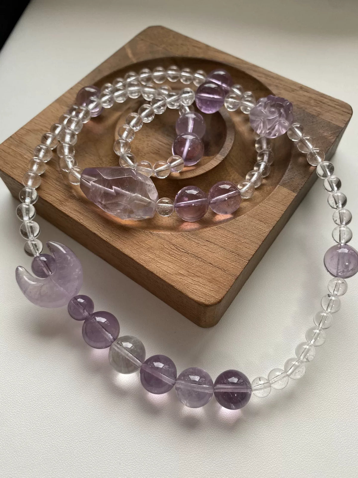 Pulsera de cuentas de Cuarzo Transparente y Cuarzo Rutilado Púrpura
