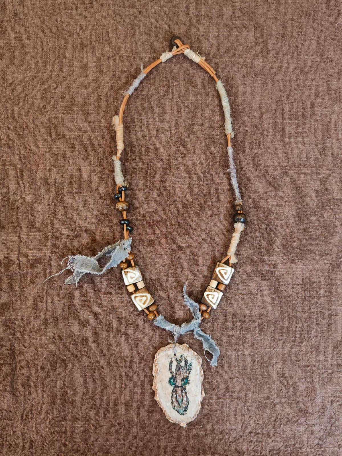 Hand Painted Fossil Pendant Yak Bone Necklace