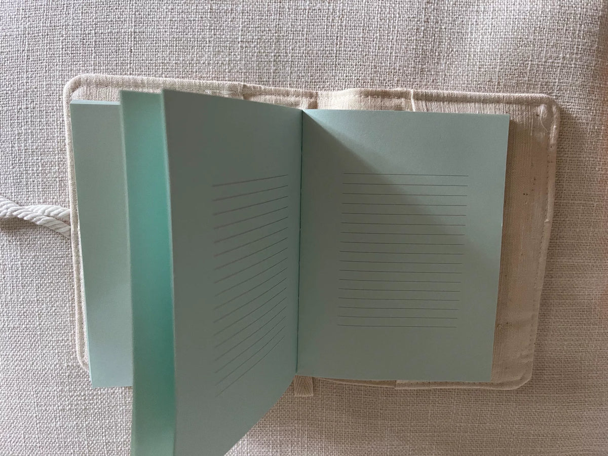 Copertina per quaderno A6 in tessuto fatta a mano
