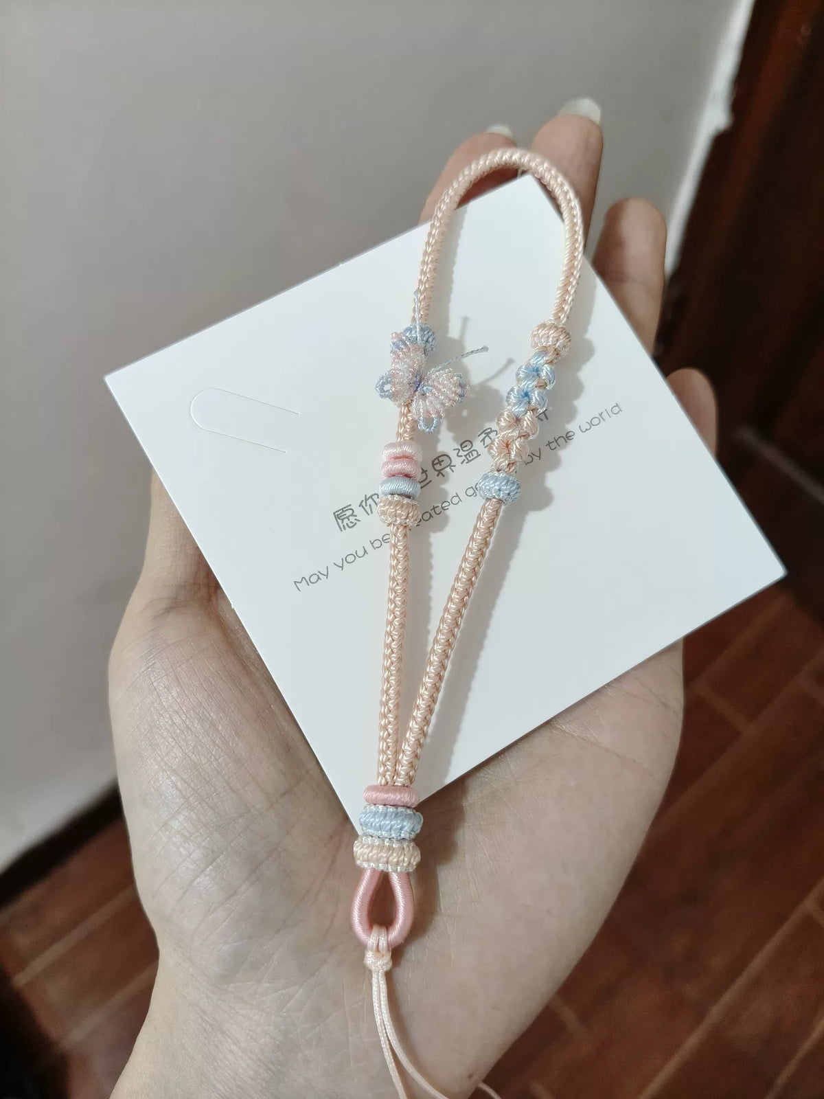 ハンドメイド編み込みスマホストラップ ブルー×ピンク グラデーション