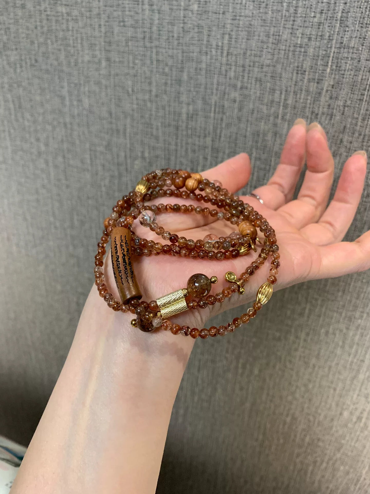 Svart guld Super Seven-träpärlor armband