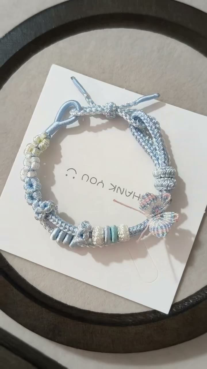 Handwoven Light Blue Bracelet with Floral Decor