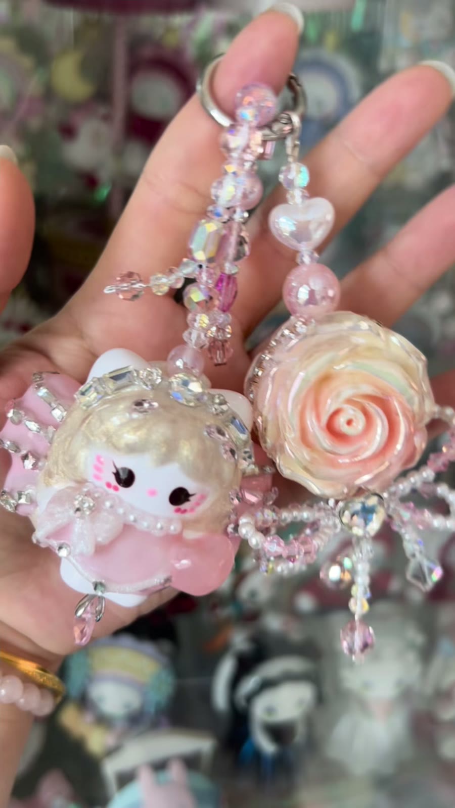 Roze Kraalpop Telefoonhanger met Strass Roos
