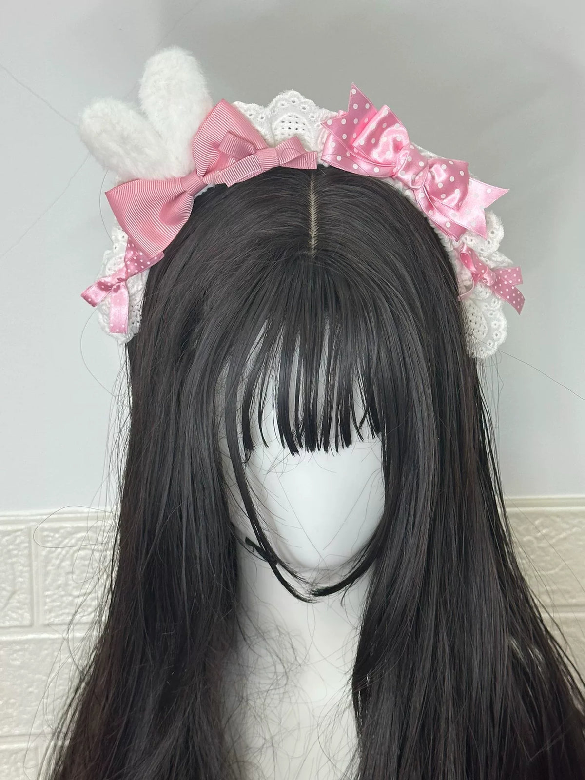 Weißes Plusch-Hasenohr-Hanband mit rosa Schleife