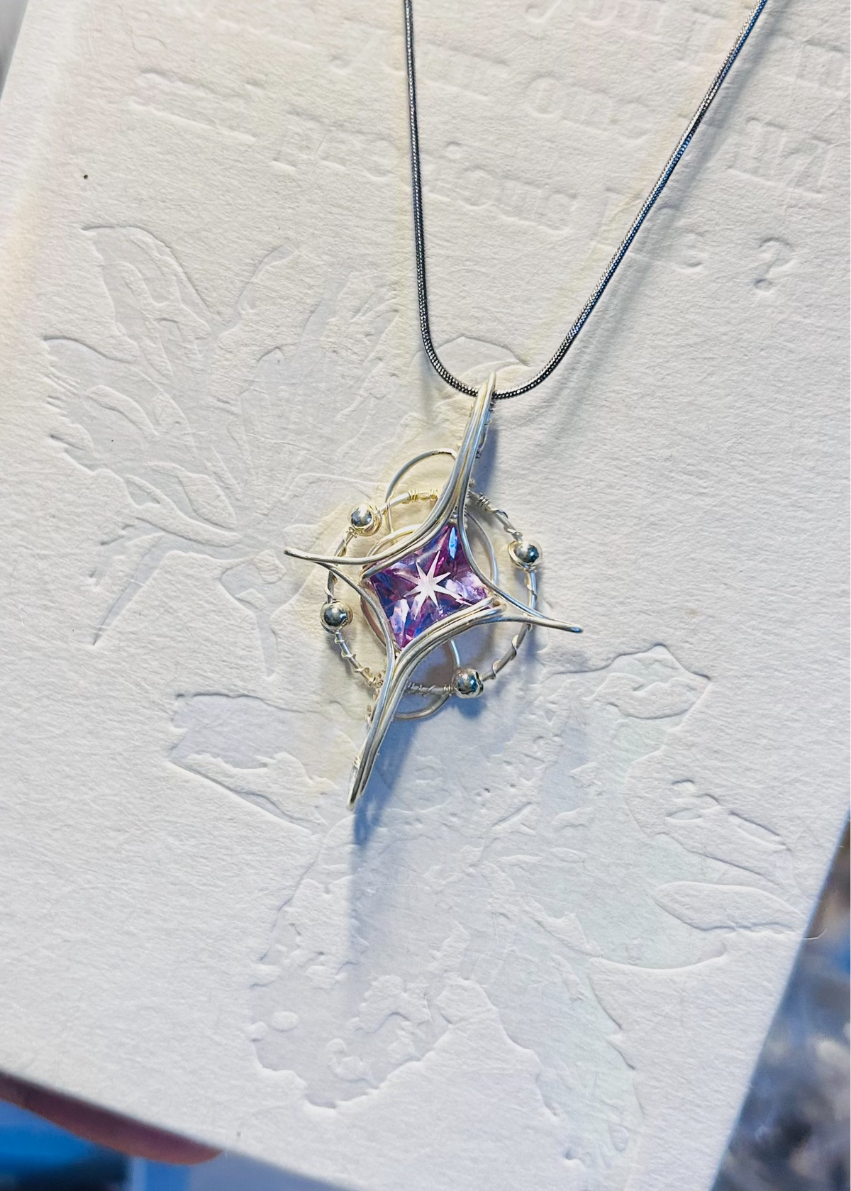 Wire Wrapped Purple Zircon Star Pendant