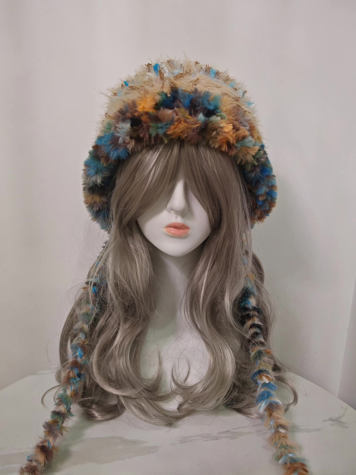 Faux Fur Hood with Braided Tassels