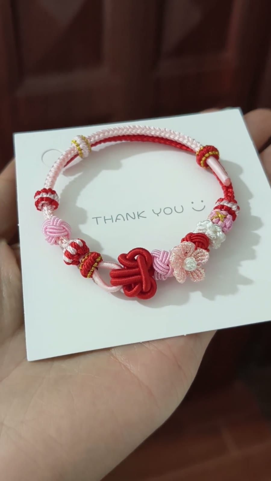 Pulsera de Nudo de Flor Roja y Rosa Trenzada a Mano