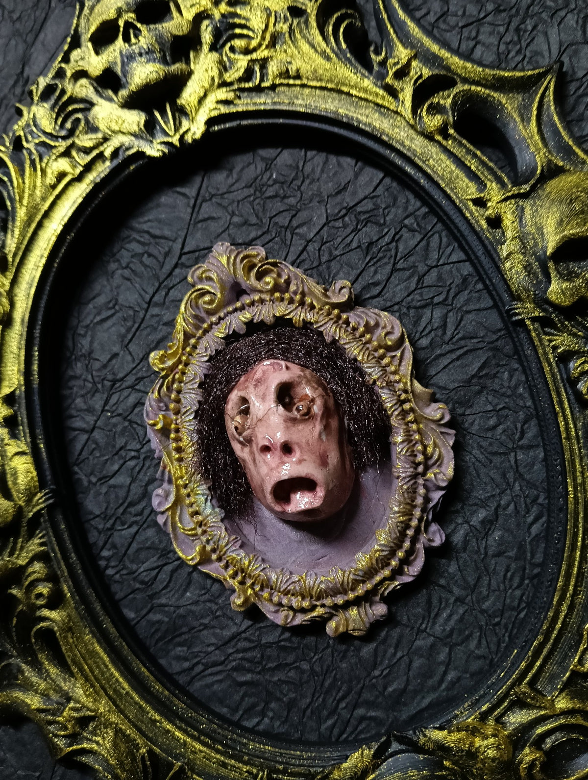 Gothic Sculpted Face Oval Frame Brooch