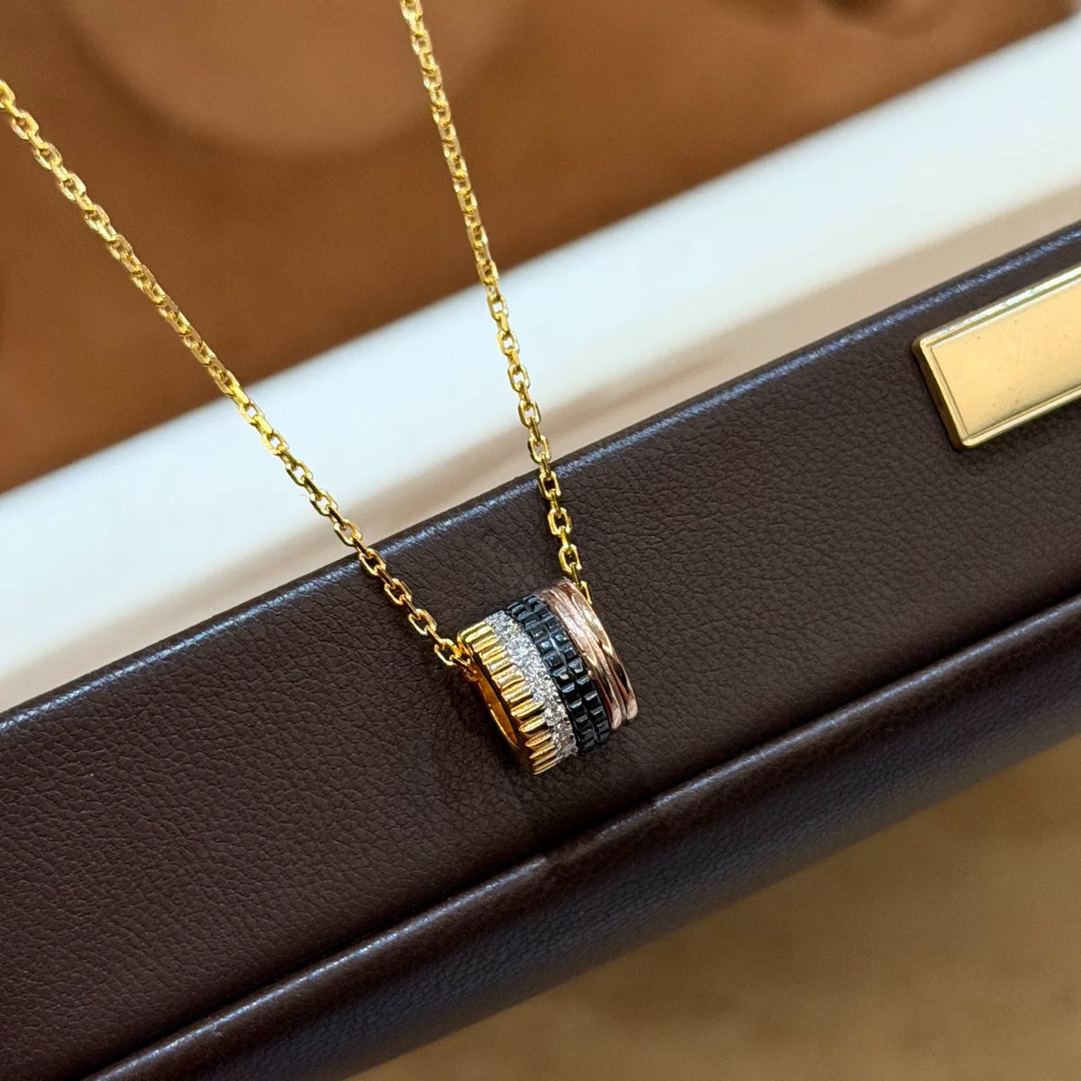 Collier pendentif en céramique plaqué or trois tons