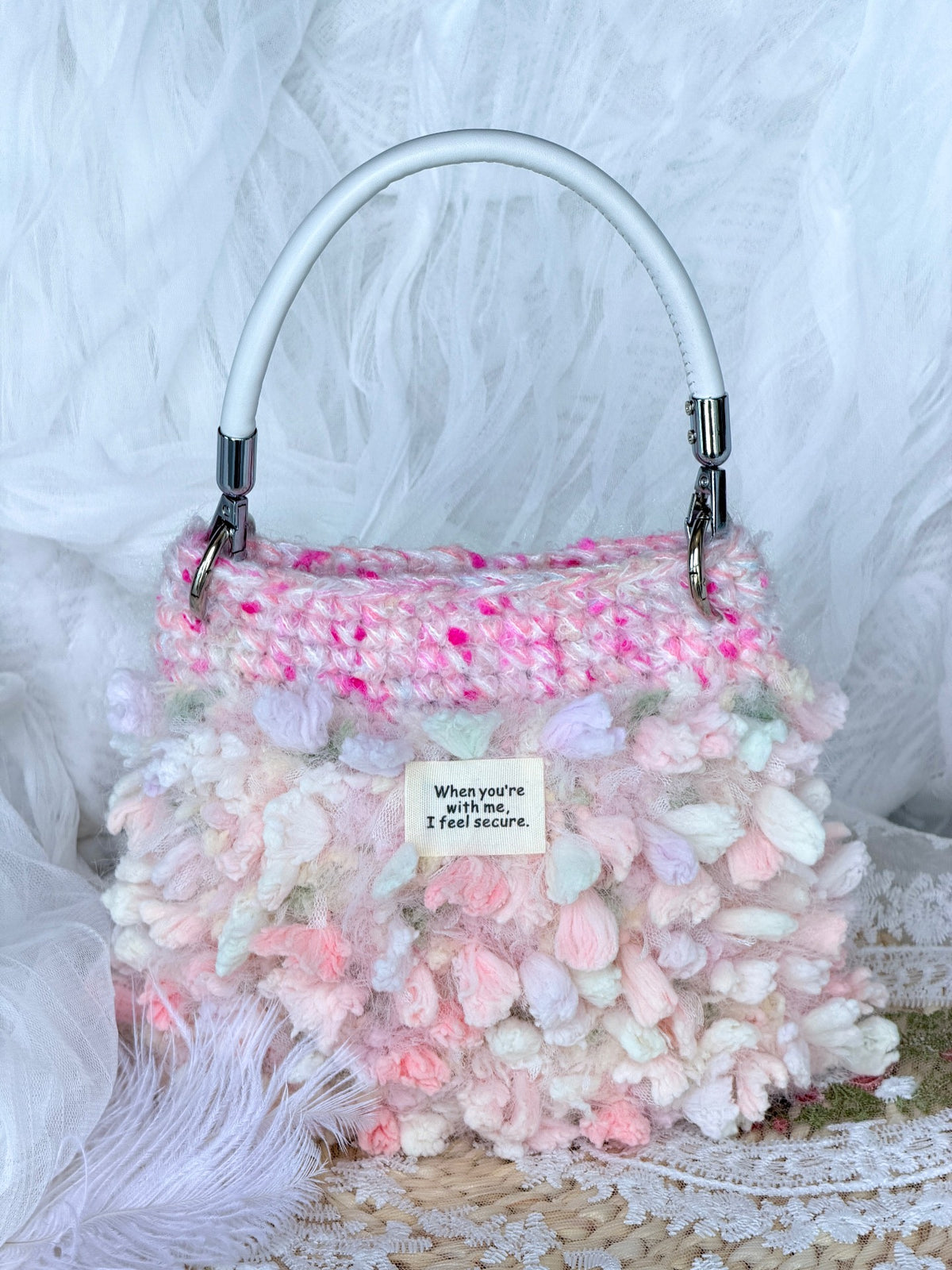 Borsa all'uncinetto rosa pesca