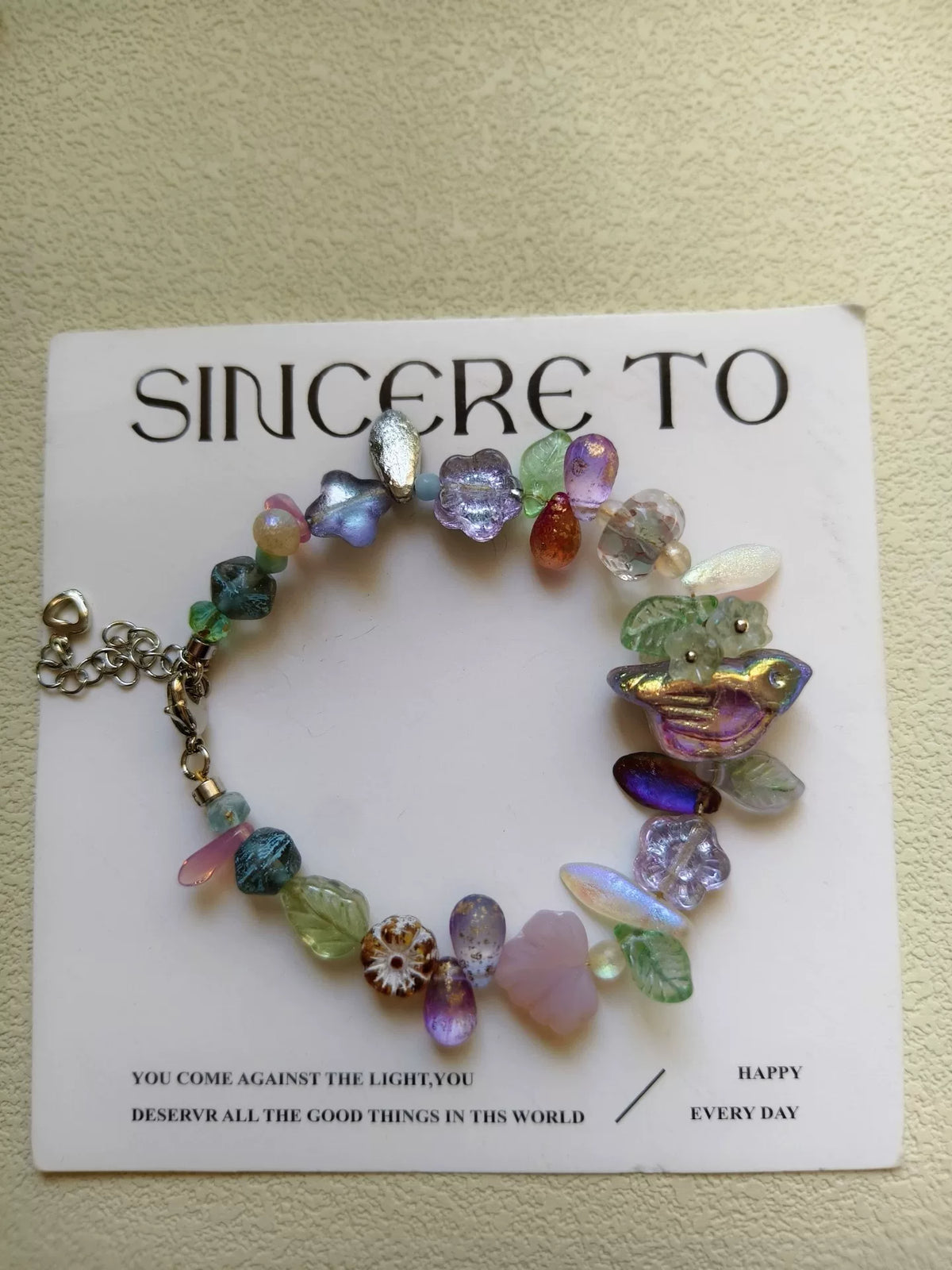 Bracelet oiseau en verre tchèque violet et or