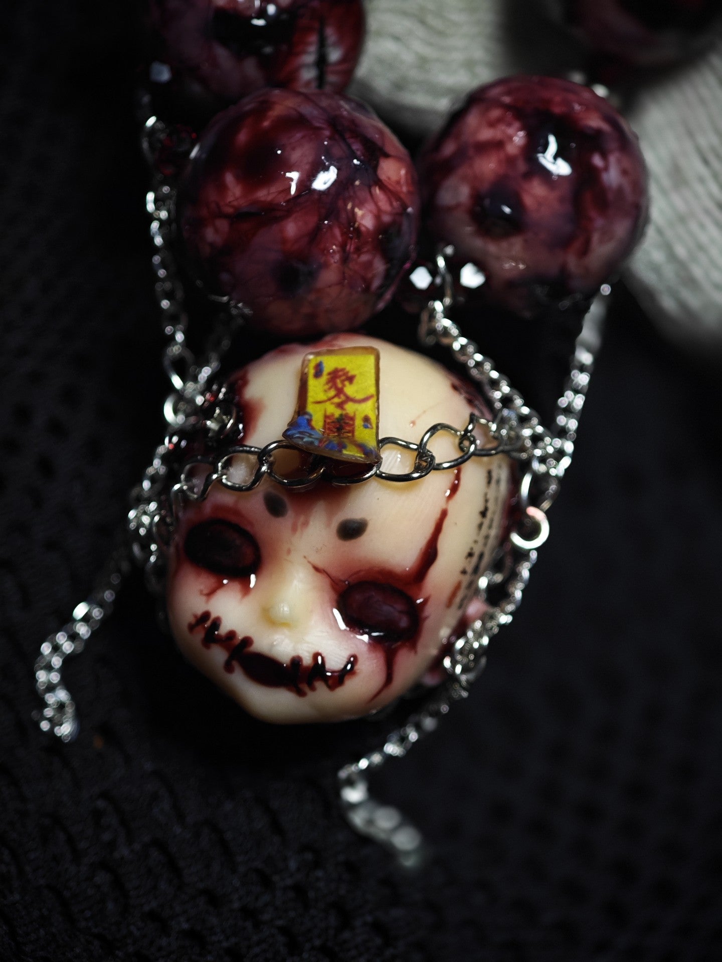 Handcrafted Doll Head Pendant with Eye Beads and Chain