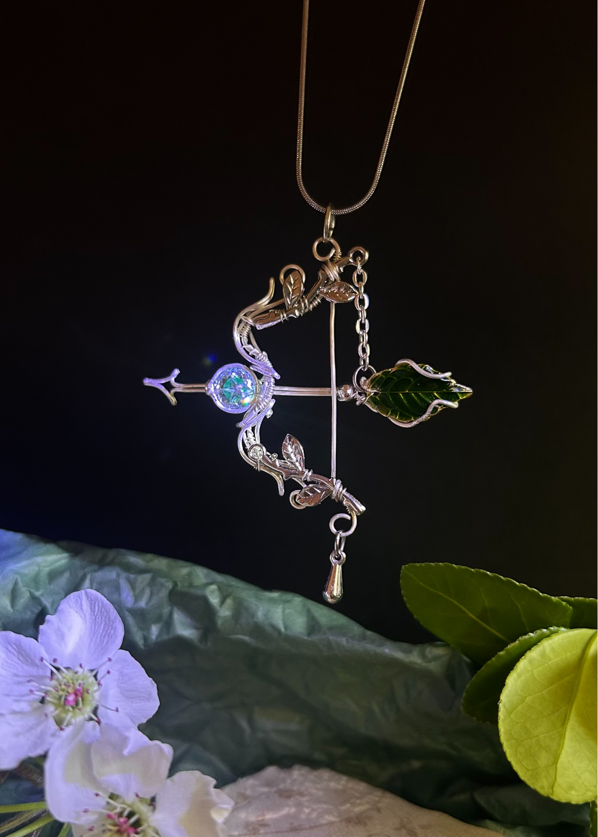 Wire Wrapped Bow Pendant with Green Leaf