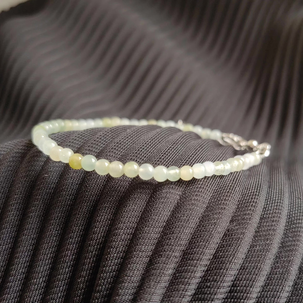 Bracelet en perles de jadeite avec chaîne d'extension en argent