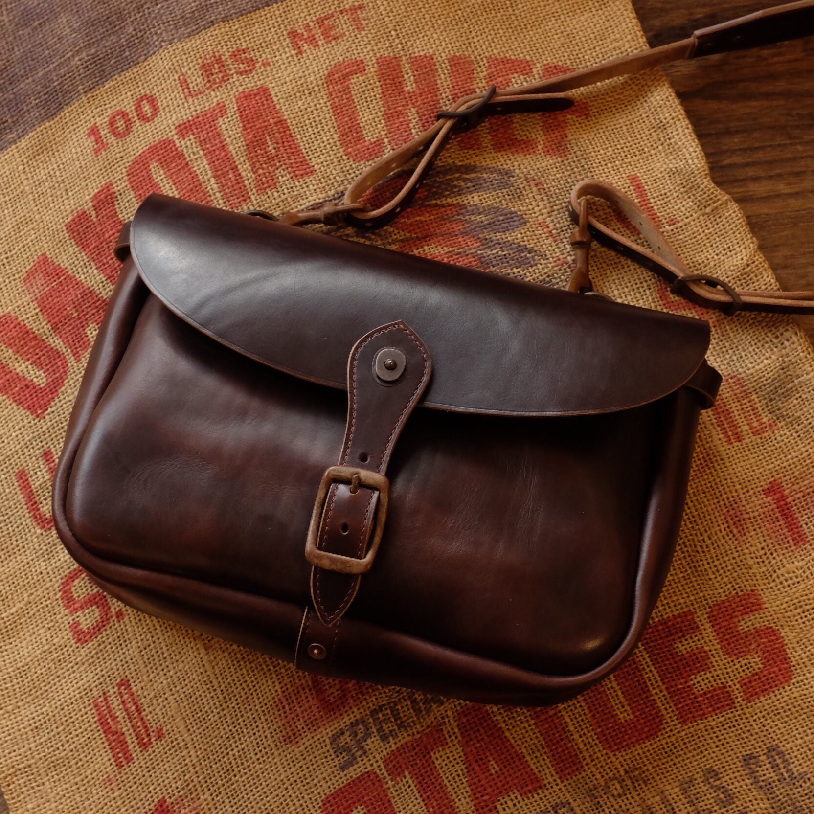 Rich Brown Leather Messenger Bag with Brass Buckle Closure