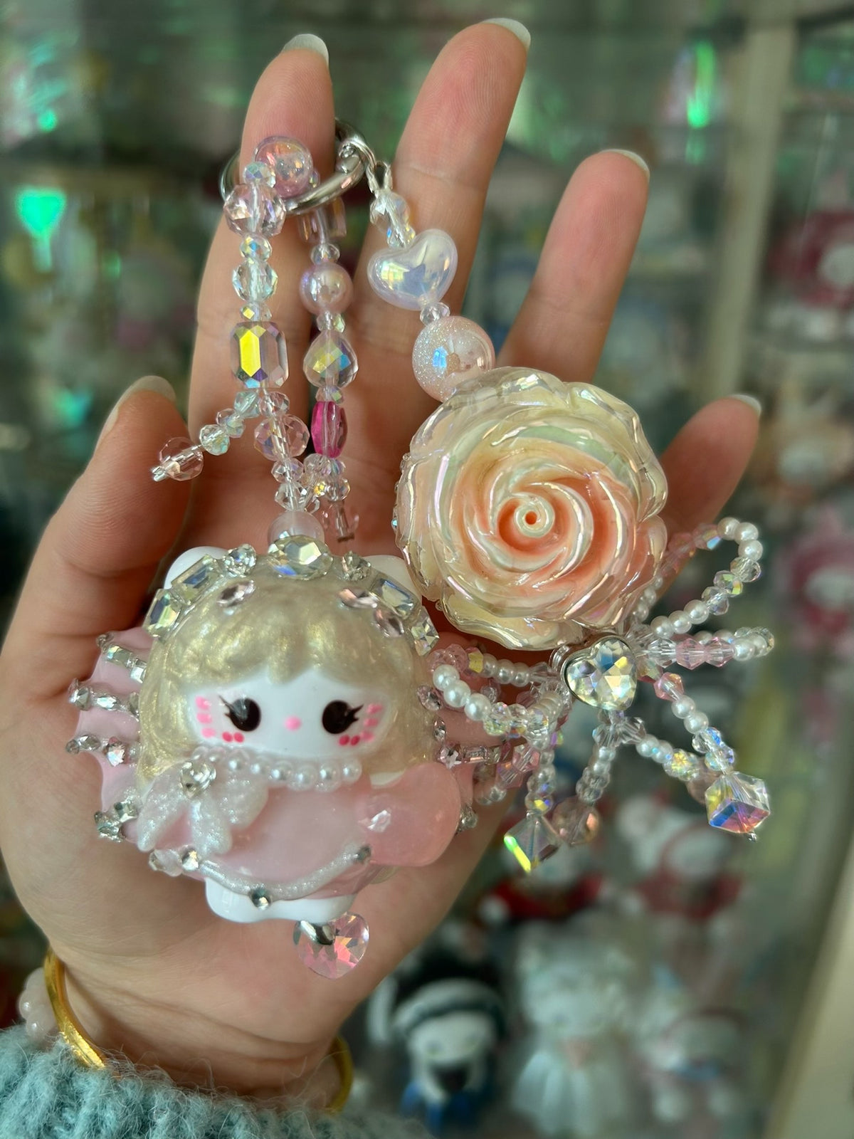 Roze Kraalpop Telefoonhanger met Strass Roos