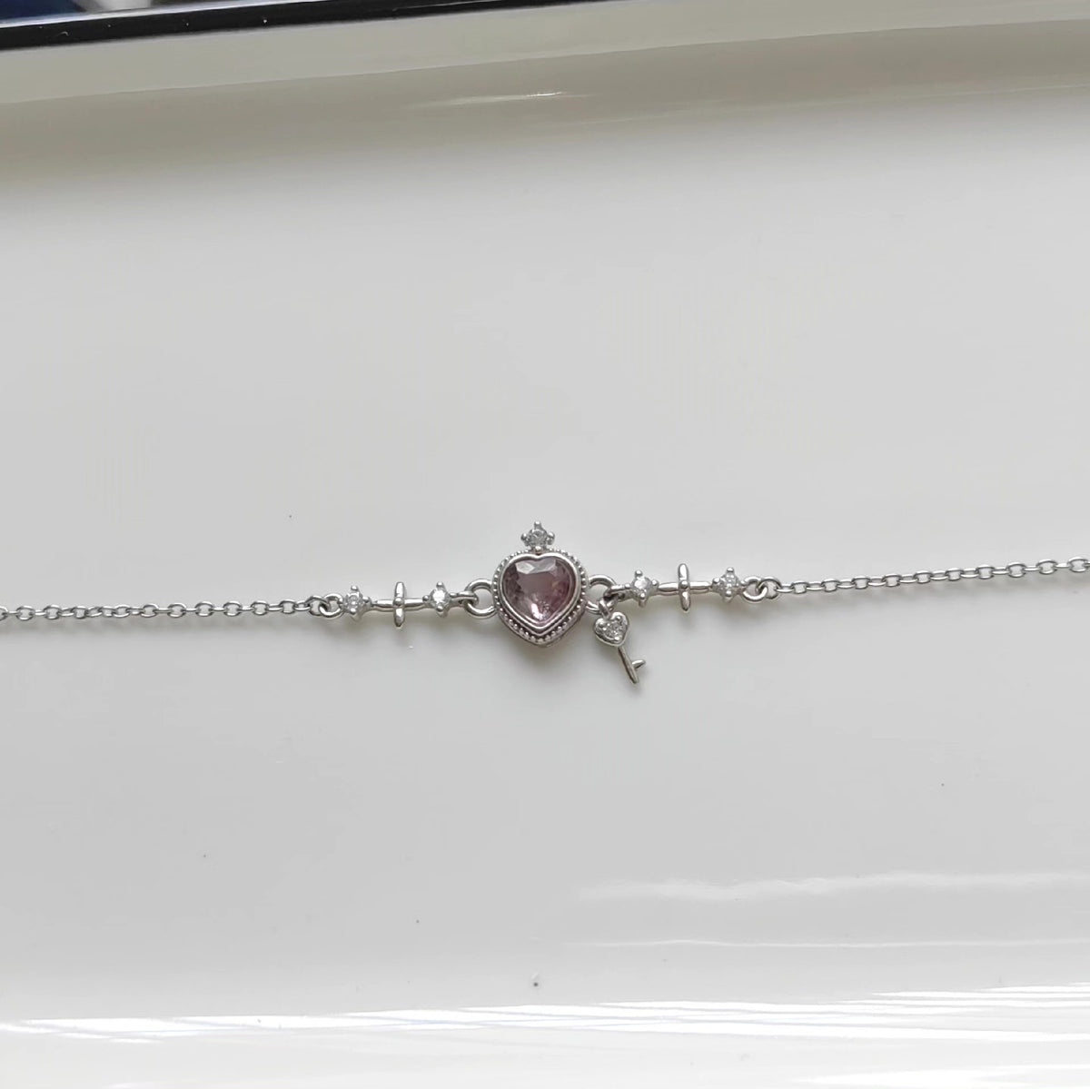 Sterbersilber Armband mit Herz, Krone und lila Tourmalin