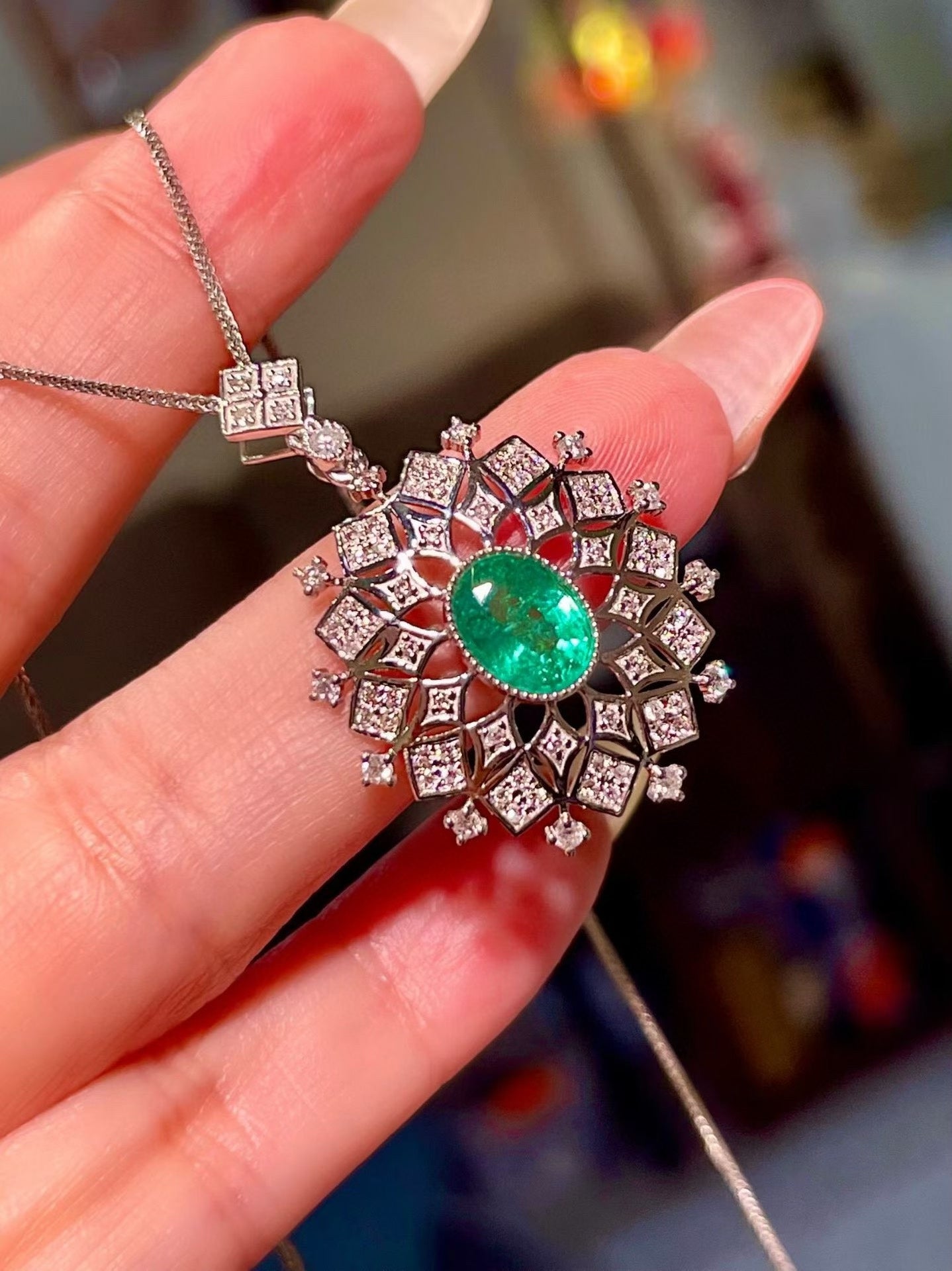 Pt950 Platinum 1.26ct Emerald and 0.53ct Diamond Halo Pendant