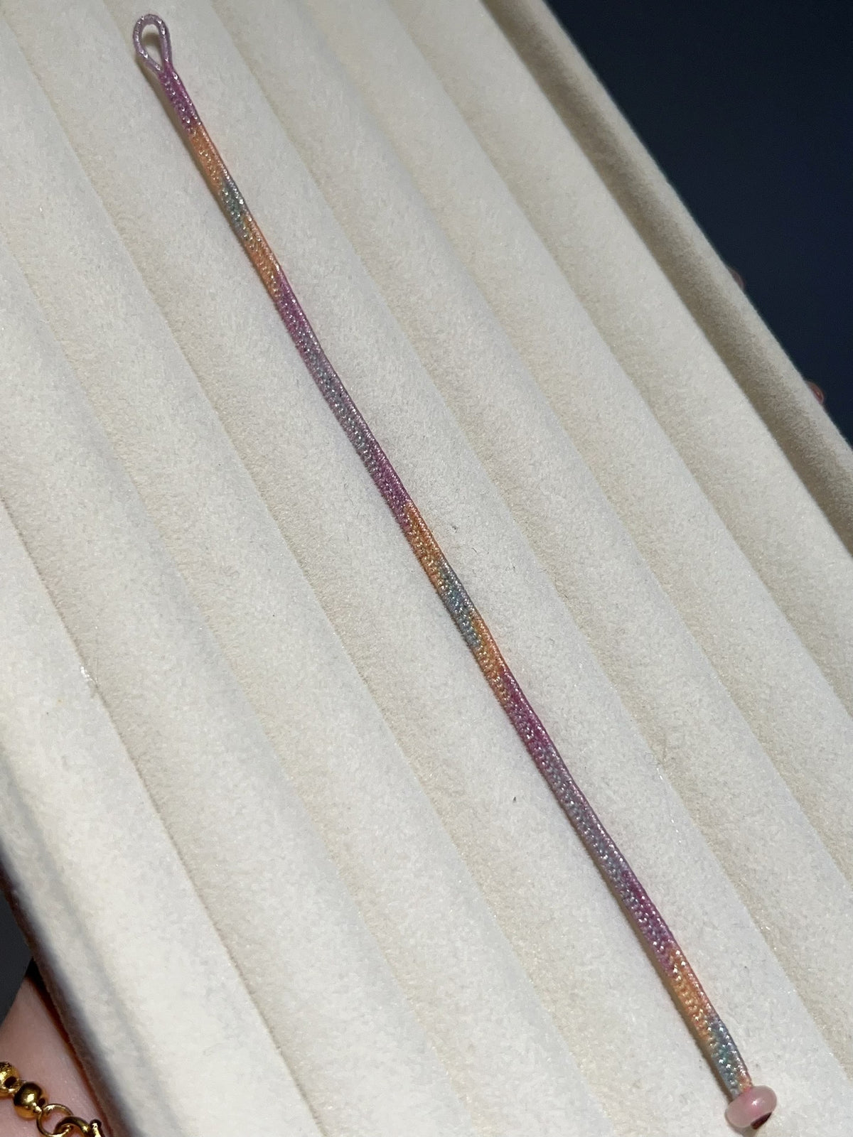 Keerbare armband van space-dyed waskoord