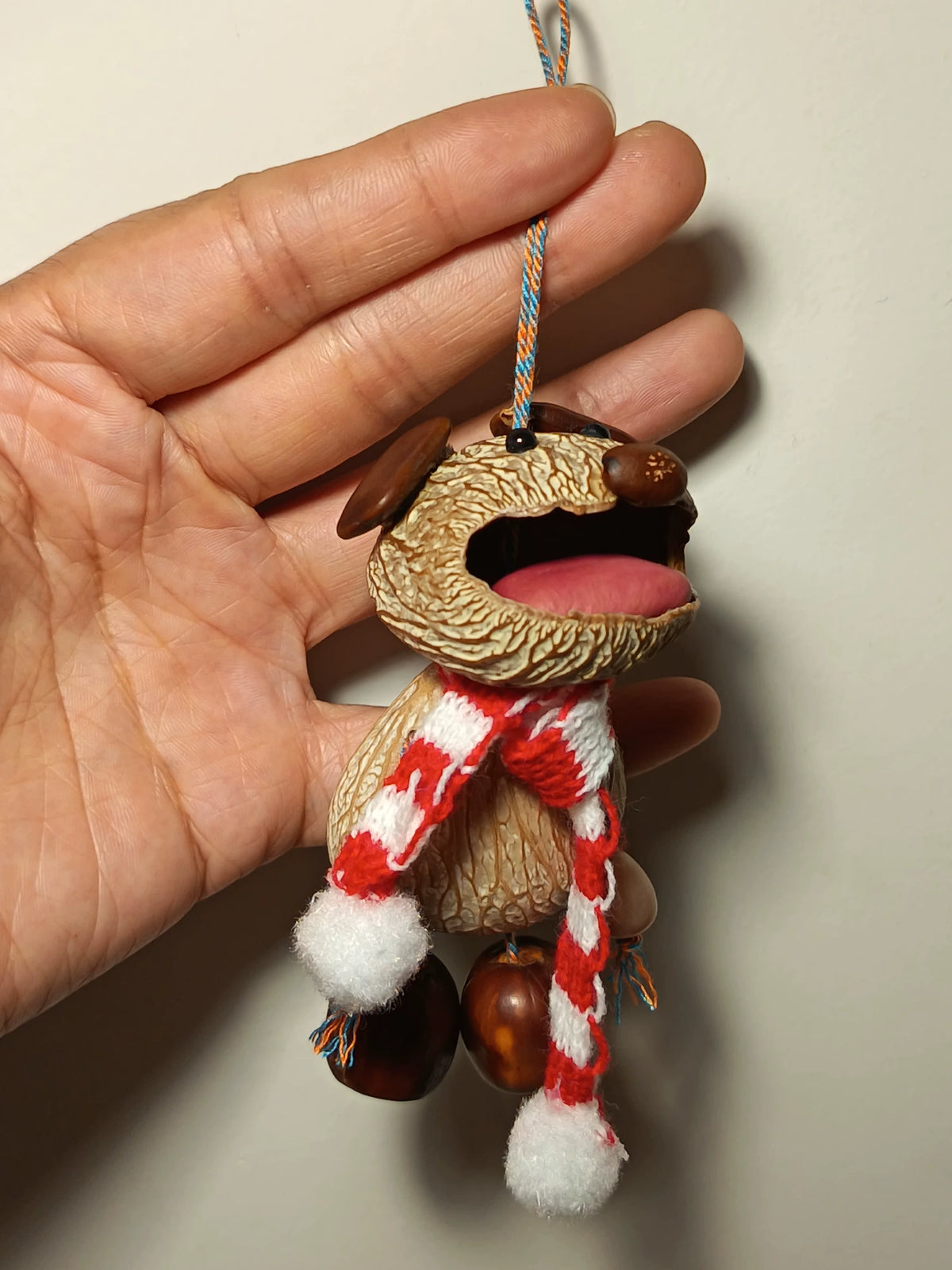 Walnut Shell Dog Rattle Pendant