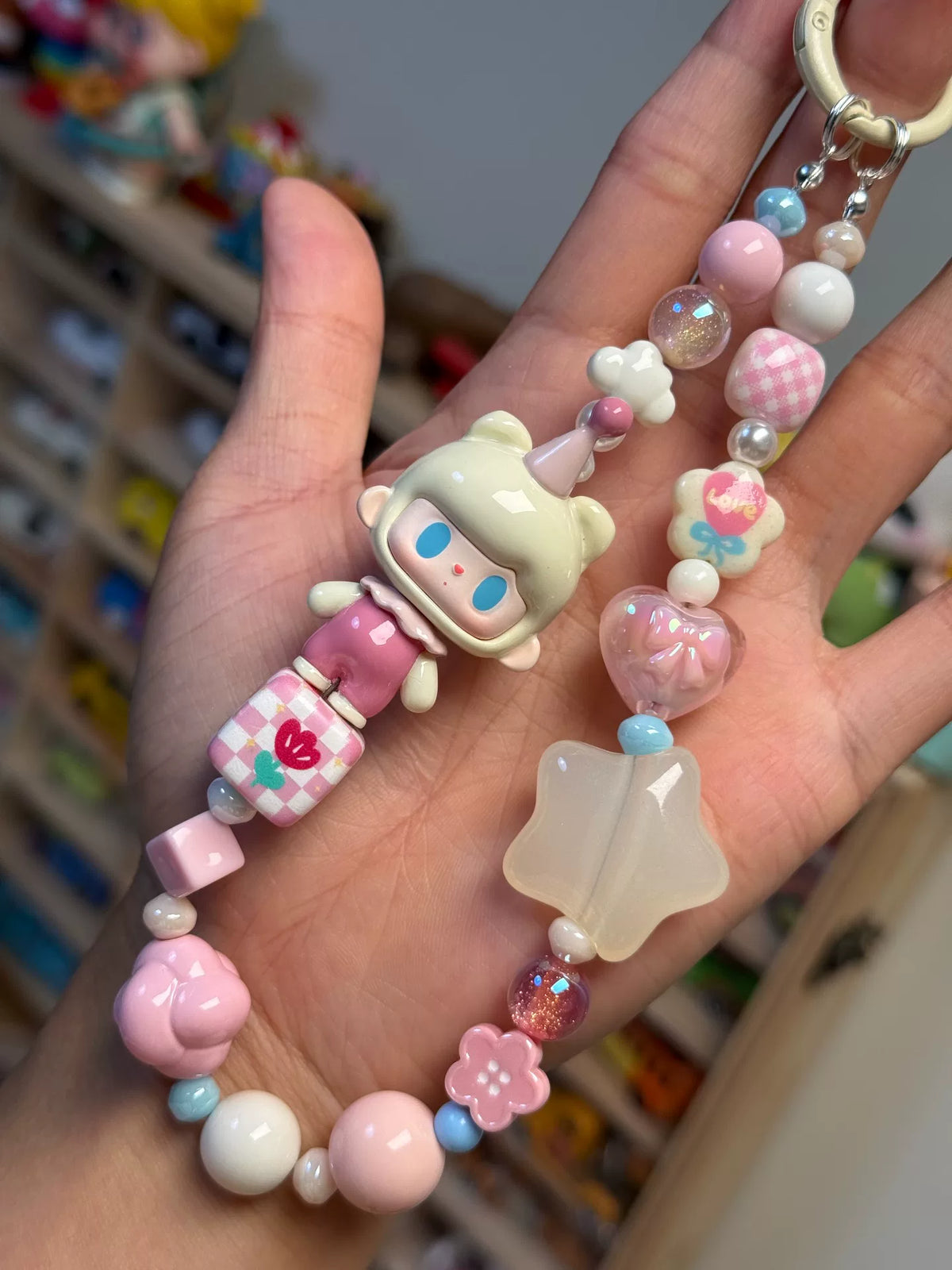Dragonne de téléphone et porte-clés aux perles et personnage à capuche d'ours