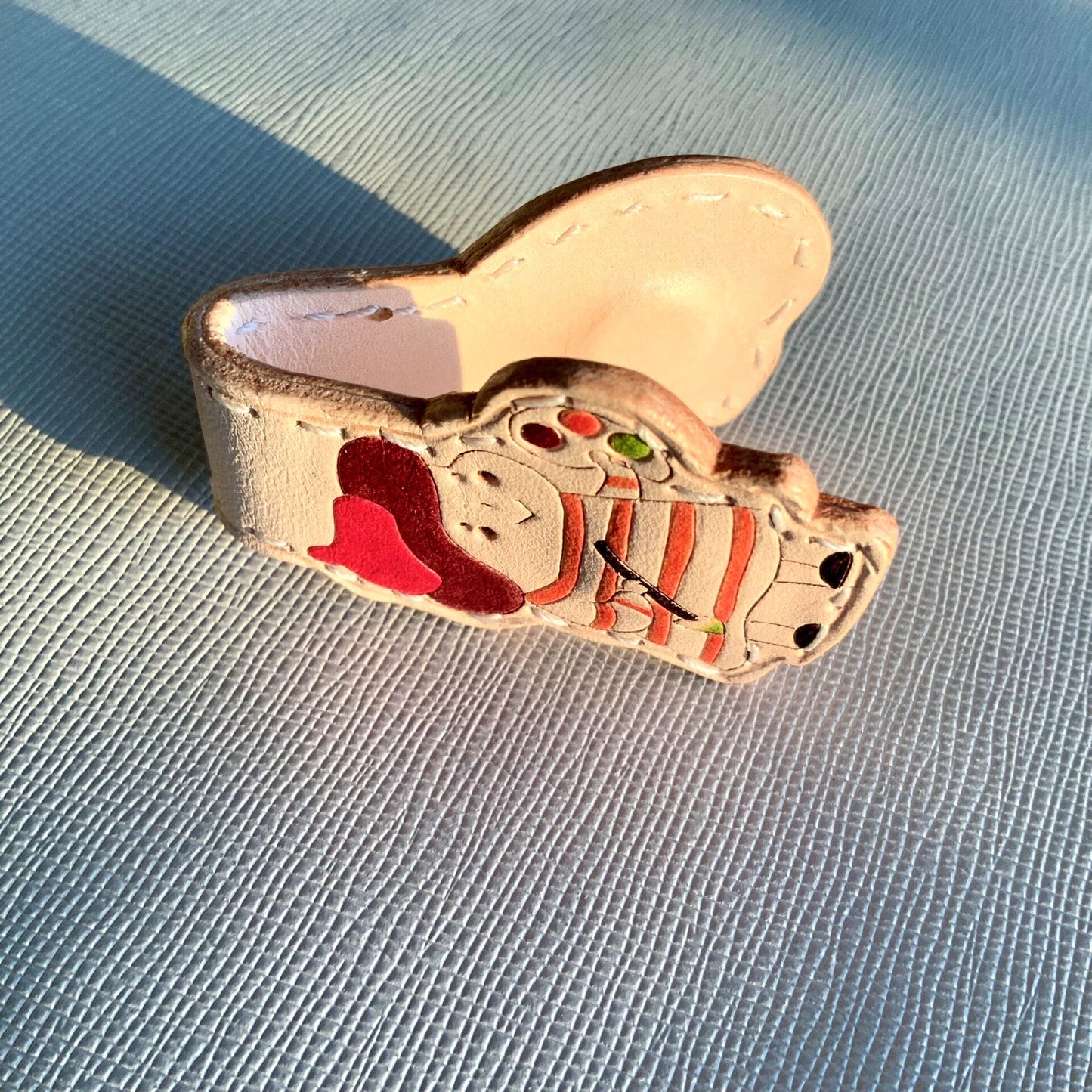 Handcrafted Leather Magnetic Bookmark with Artist Character Design